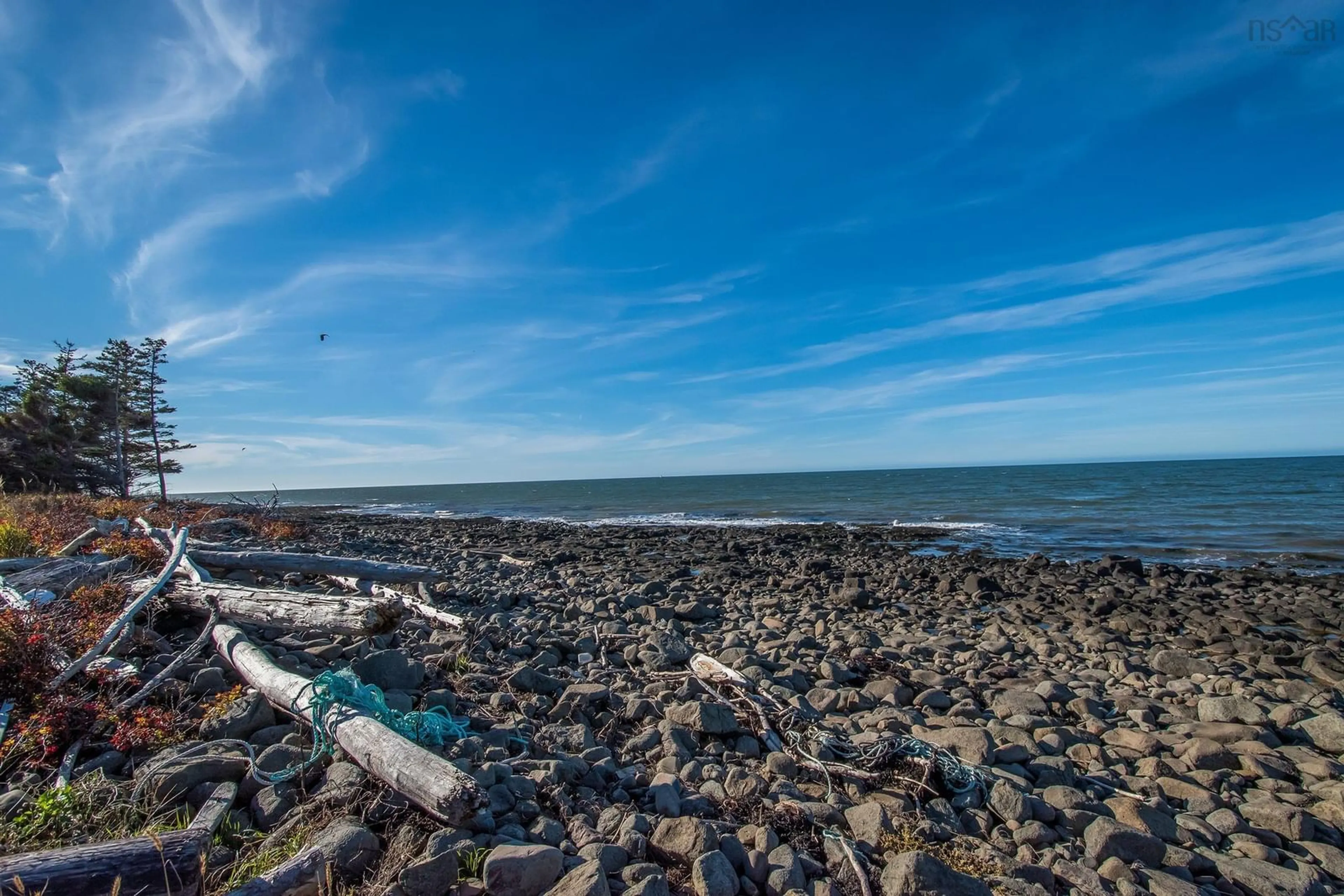 A pic from outside/outdoor area/front of a property/back of a property/a pic from drone, water/lake/river/ocean view for 6437 Shore Road West, Youngs Cove Nova Scotia B0S 1L0