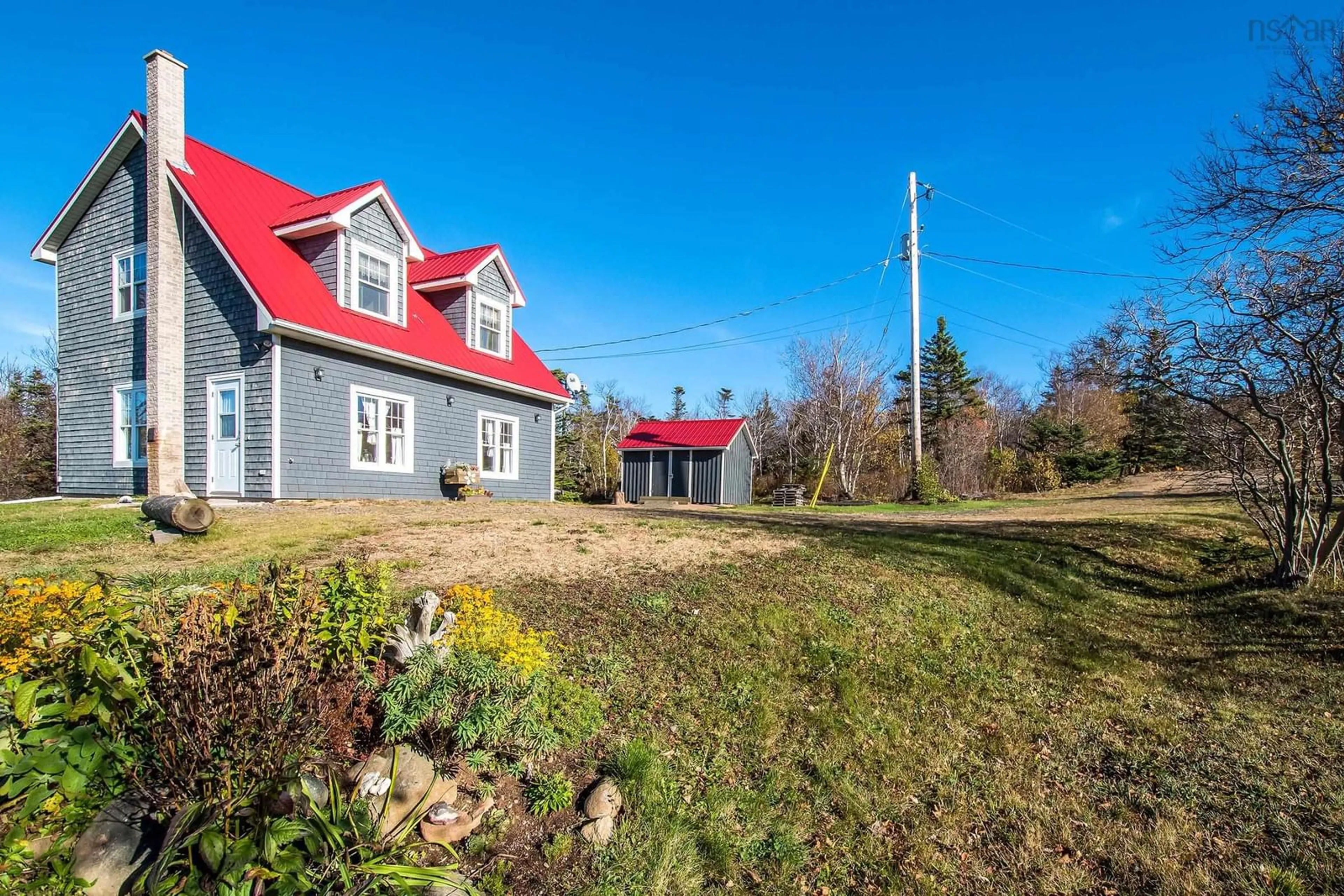 A pic from outside/outdoor area/front of a property/back of a property/a pic from drone, building for 6437 Shore Road West, Youngs Cove Nova Scotia B0S 1L0