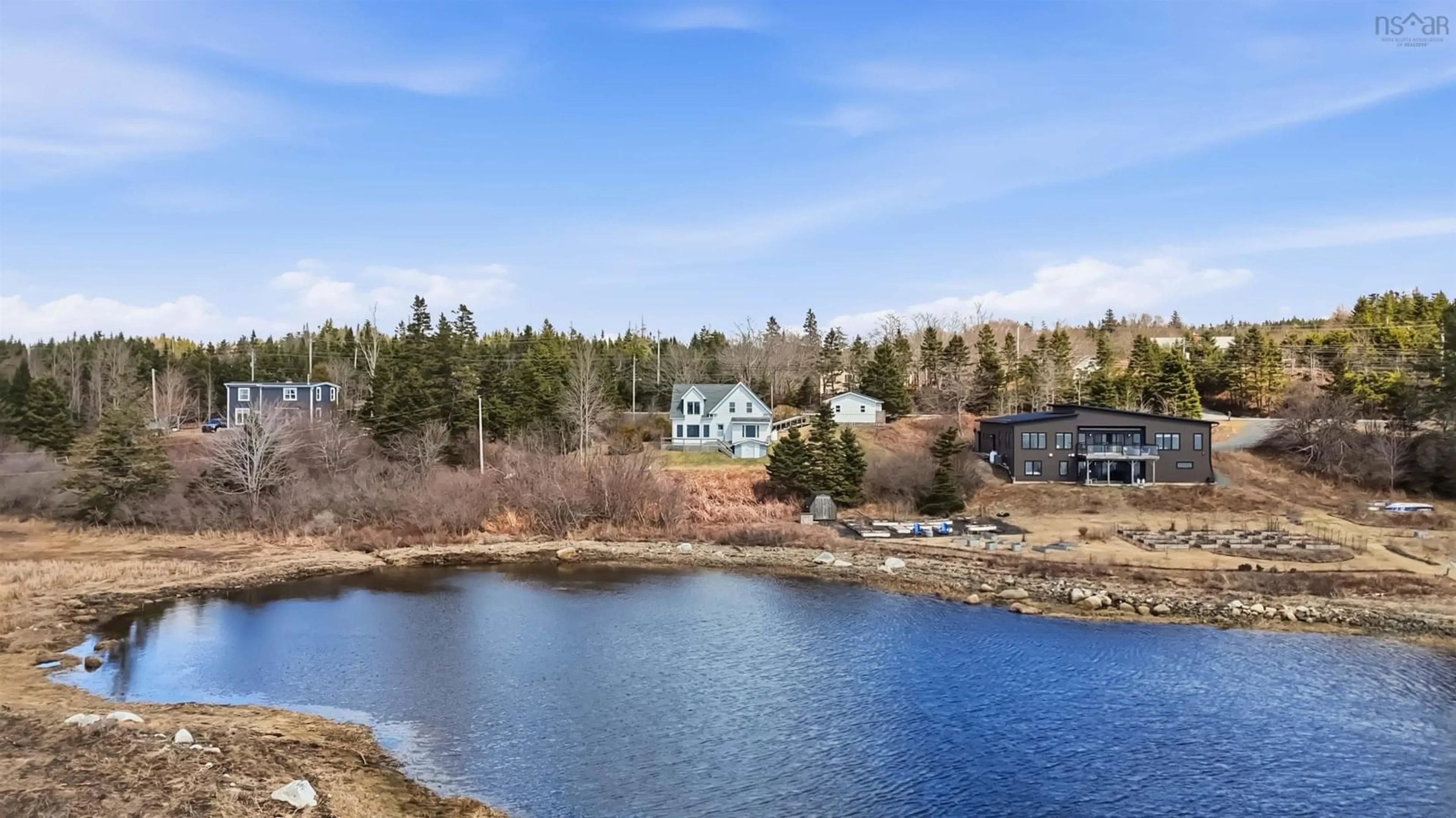 A pic from outside/outdoor area/front of a property/back of a property/a pic from drone, water/lake/river/ocean view for 8742 Highway 7, Smiths Settlement Nova Scotia B0J 2L0