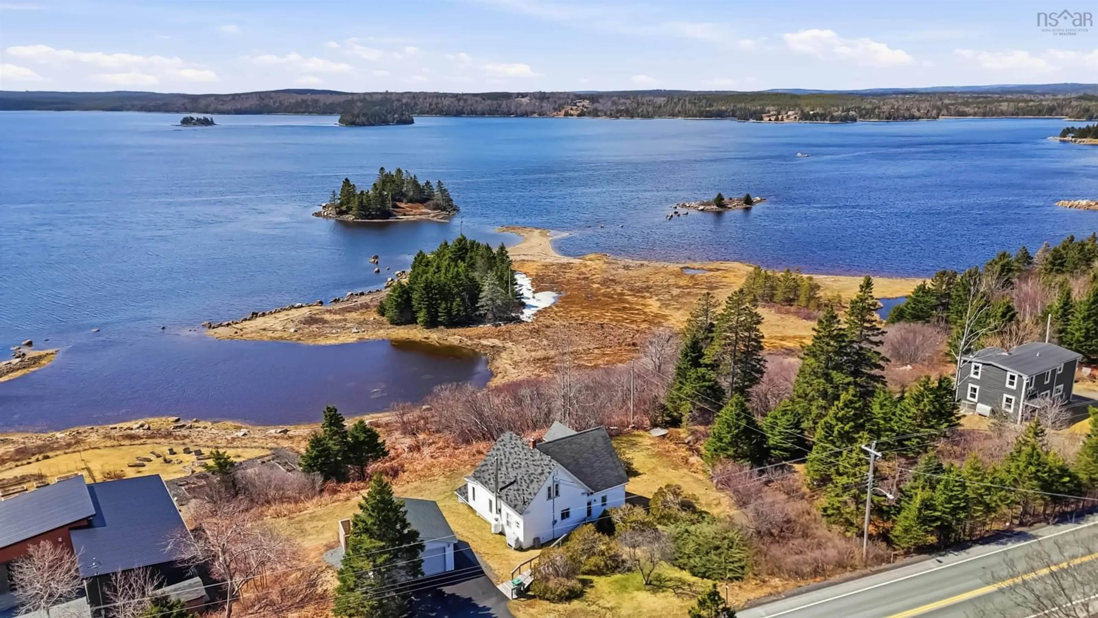 A pic from outside/outdoor area/front of a property/back of a property/a pic from drone, water/lake/river/ocean view for 8742 Highway 7, Smiths Settlement Nova Scotia B0J 2L0
