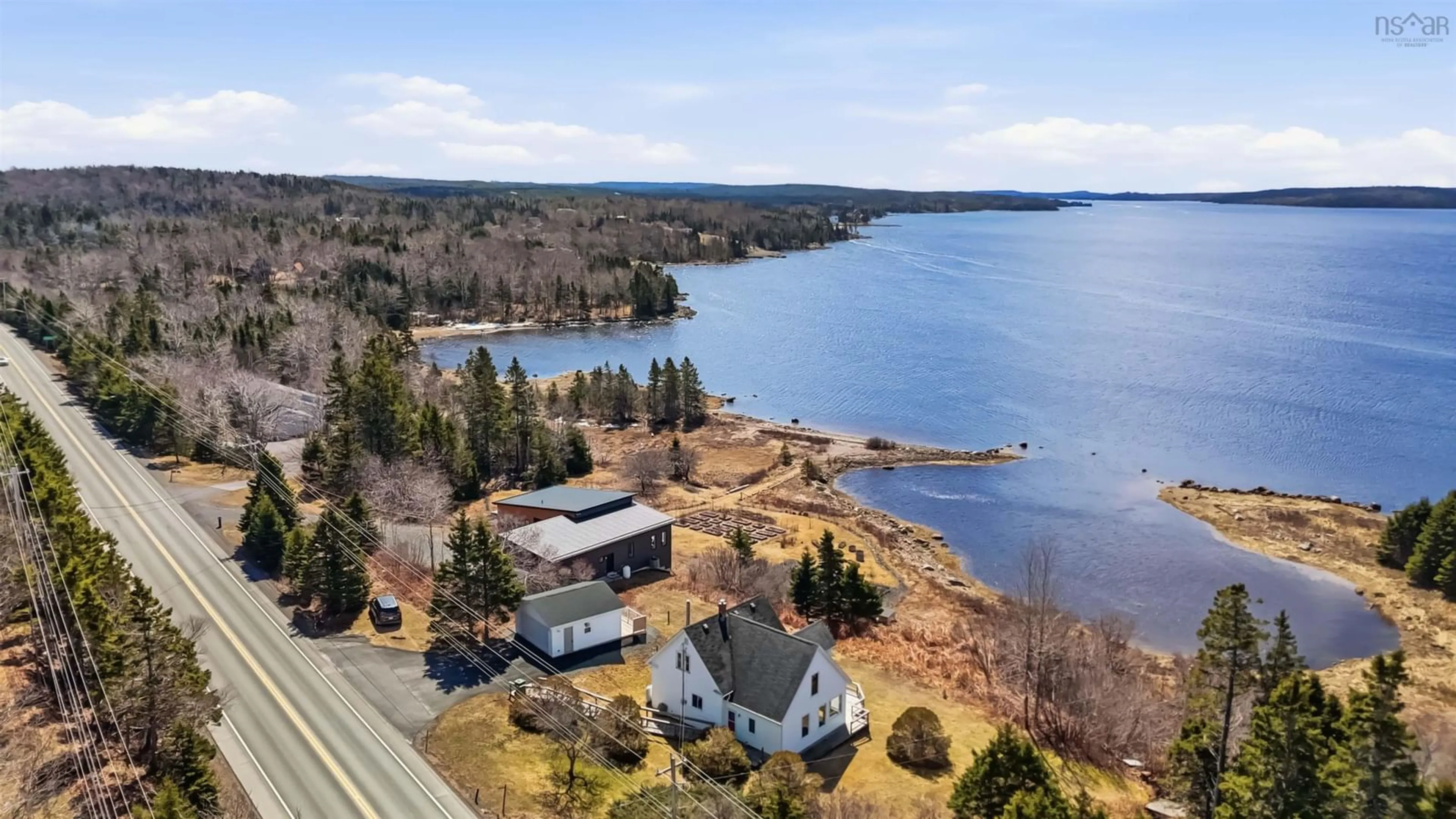 A pic from outside/outdoor area/front of a property/back of a property/a pic from drone, water/lake/river/ocean view for 8742 Highway 7, Smiths Settlement Nova Scotia B0J 2L0