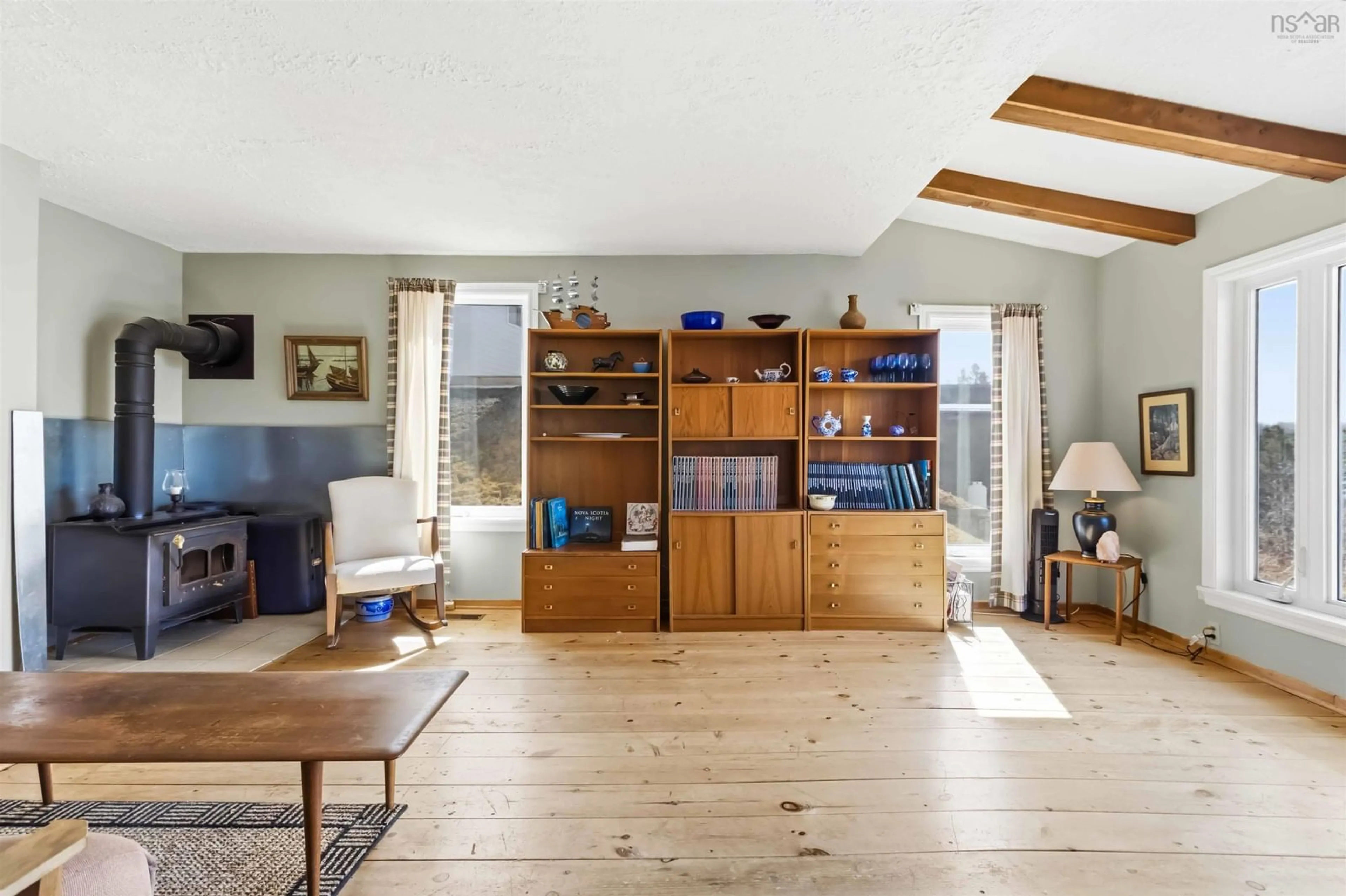 Living room with furniture, wood/laminate floor for 8742 Highway 7, Smiths Settlement Nova Scotia B0J 2L0