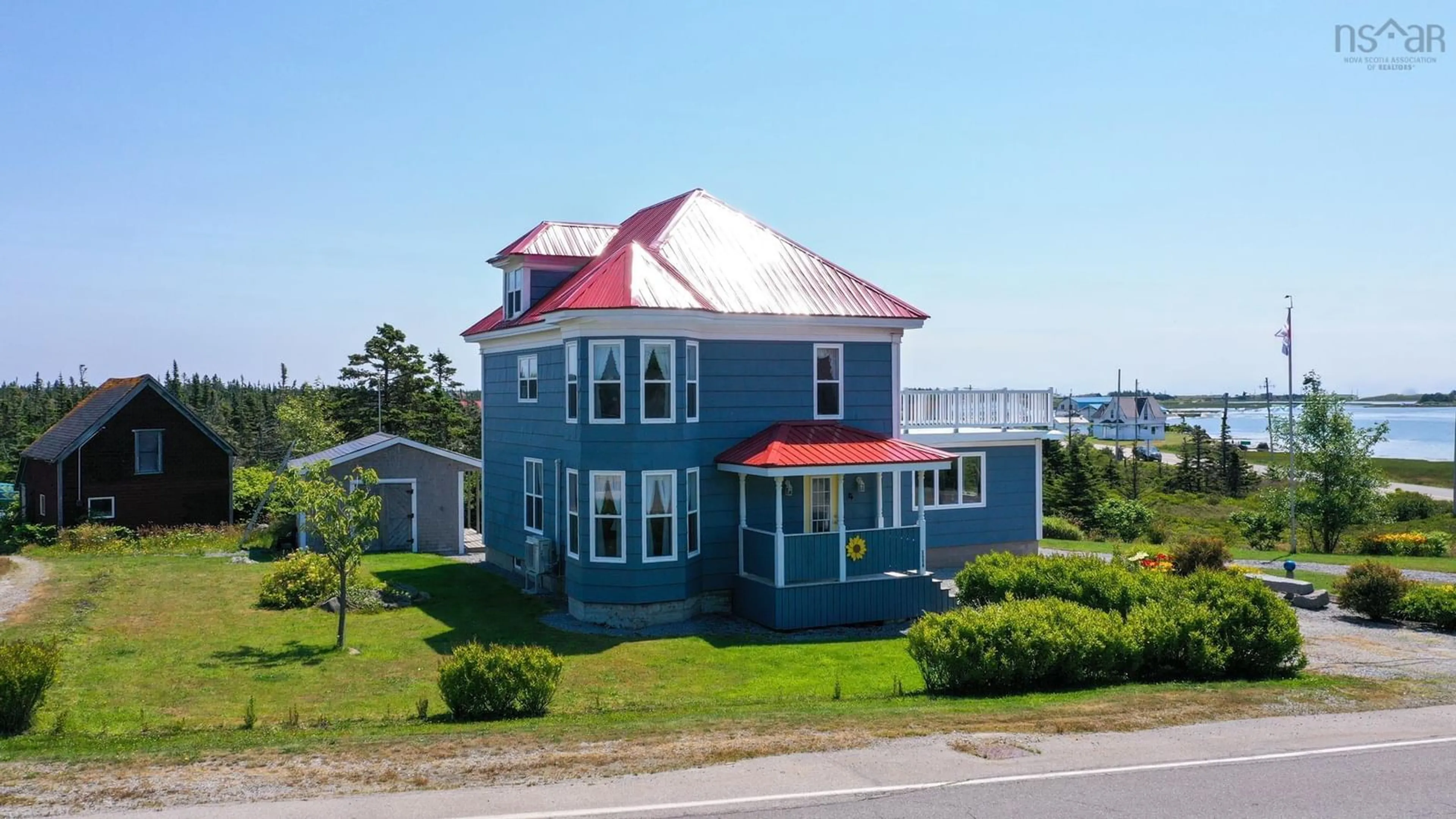 A pic from outside/outdoor area/front of a property/back of a property/a pic from drone, building for 3009 Main St, Clark's Harbour Nova Scotia B0W 1P0