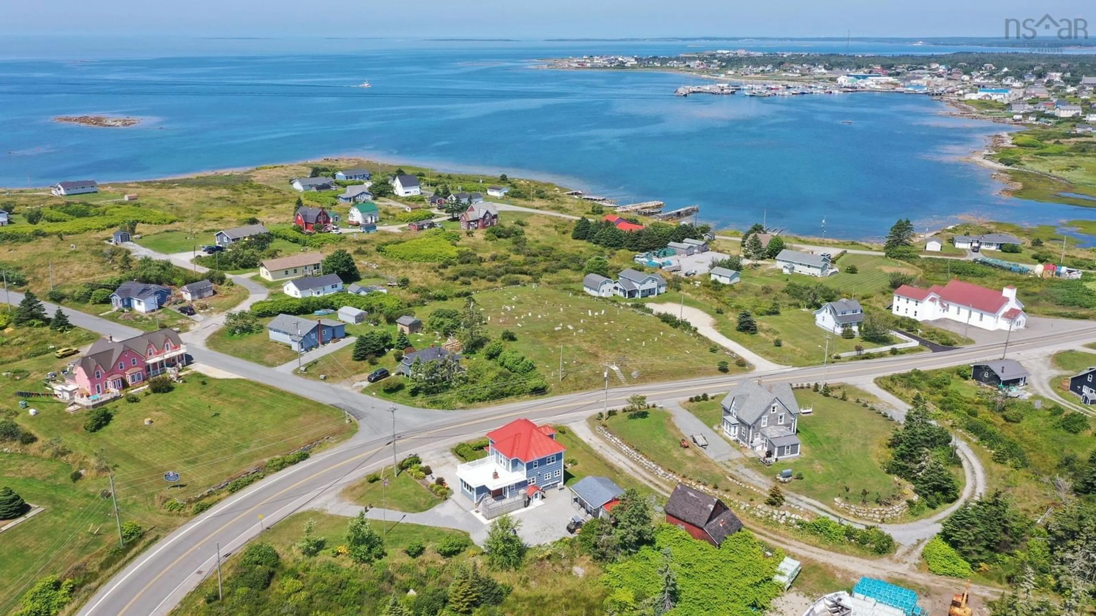 A pic from outside/outdoor area/front of a property/back of a property/a pic from drone, water/lake/river/ocean view for 3009 Main St, Clark's Harbour Nova Scotia B0W 1P0
