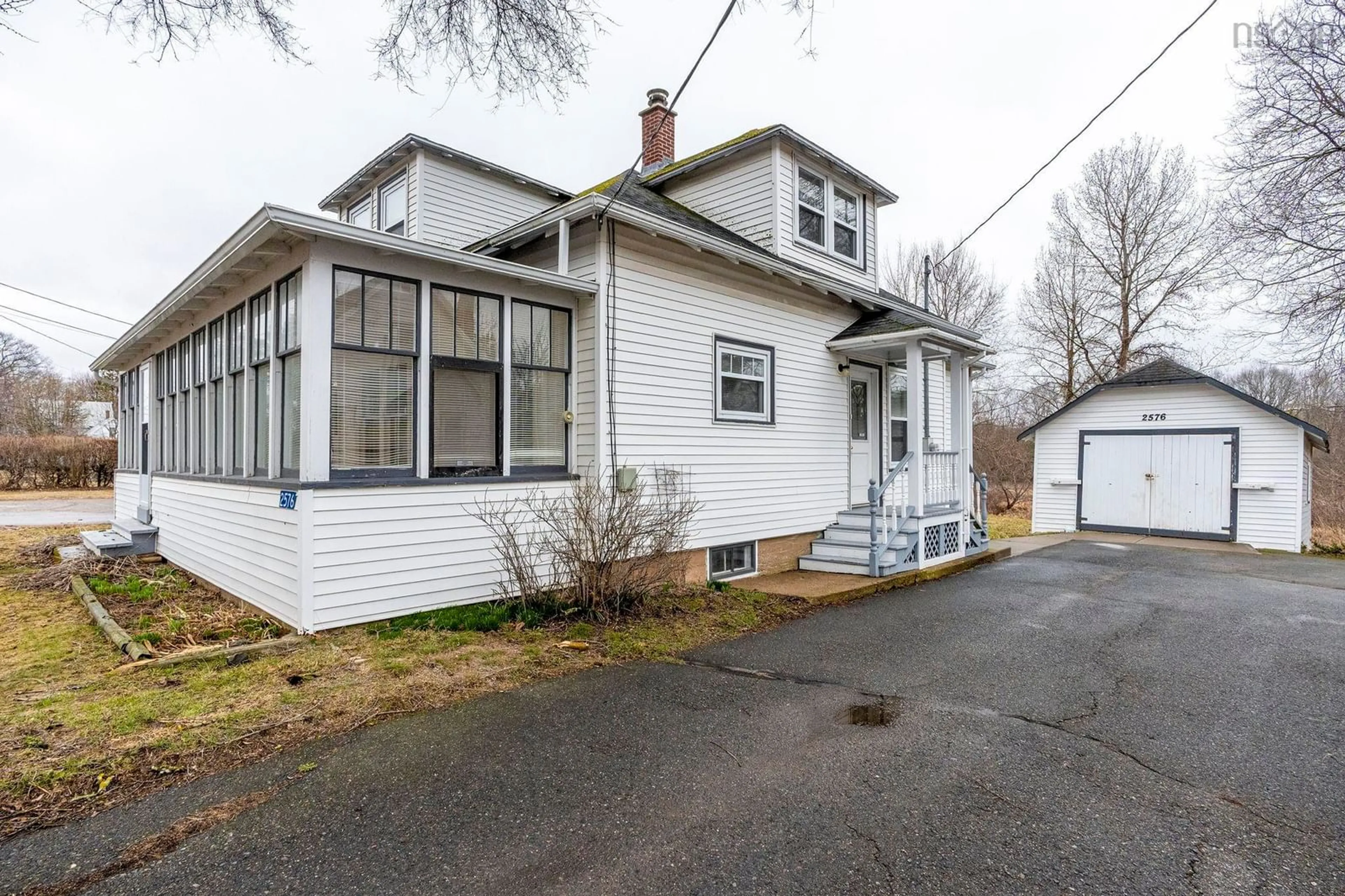 Home with vinyl exterior material, street for 2576 1 Hwy, Aylesford Nova Scotia B0P 1C0