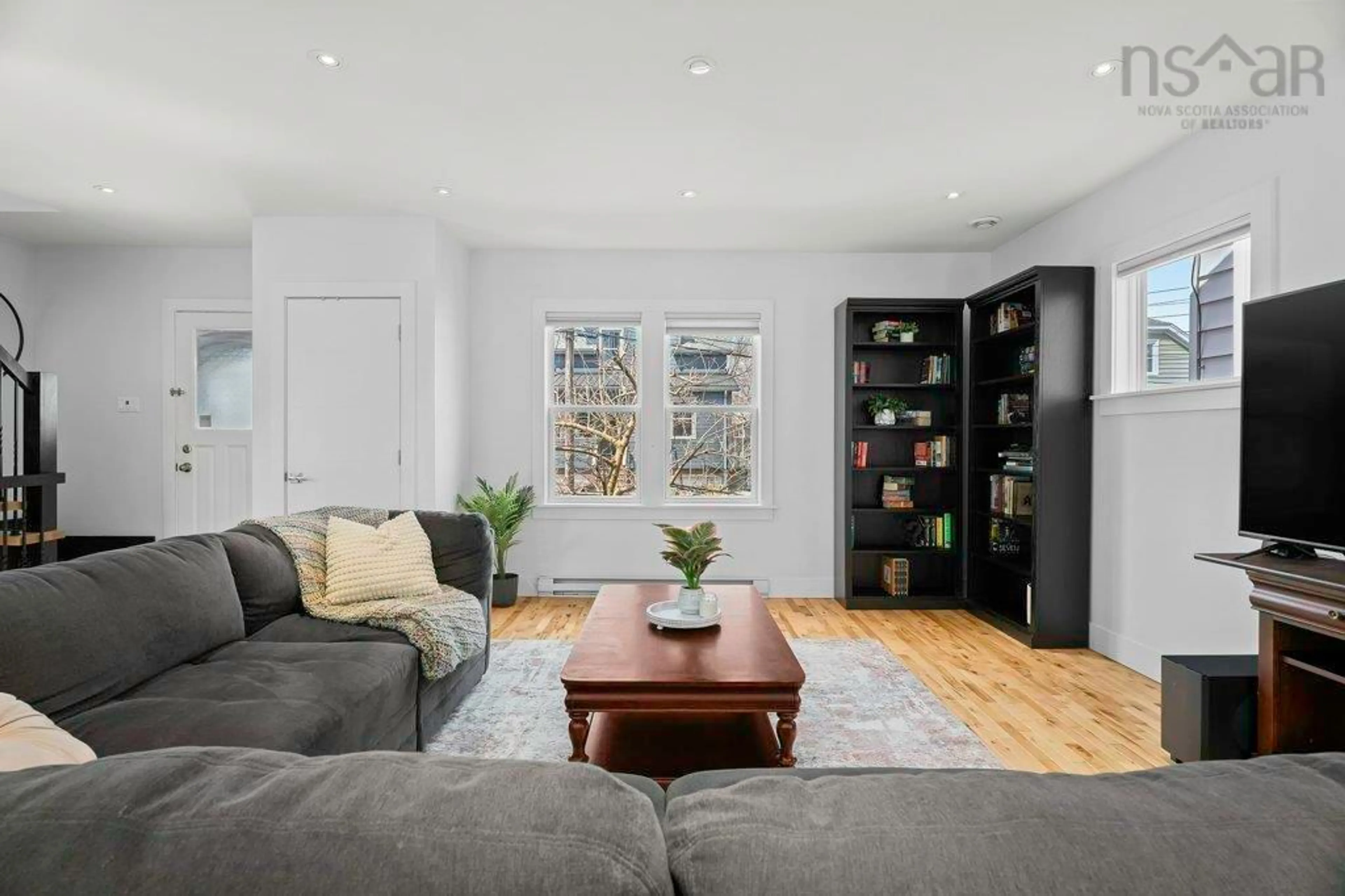 Living room with furniture, wood/laminate floor for 6262 Windcrest Terr, Halifax Nova Scotia B3L 1T2