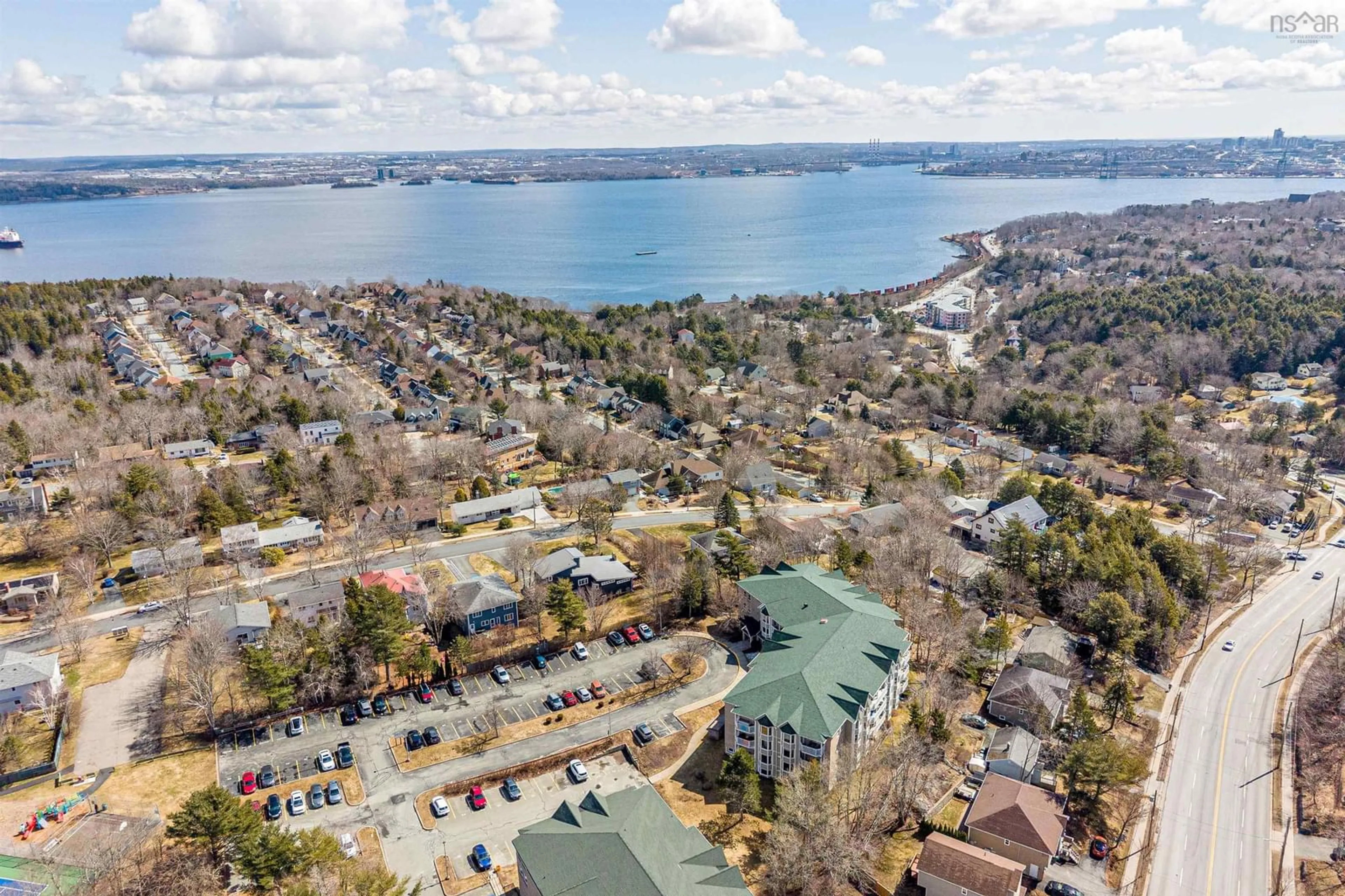 A pic from outside/outdoor area/front of a property/back of a property/a pic from drone, water/lake/river/ocean view for 87 Kearney Lake Rd #307, Halifax Nova Scotia B3M 4H1