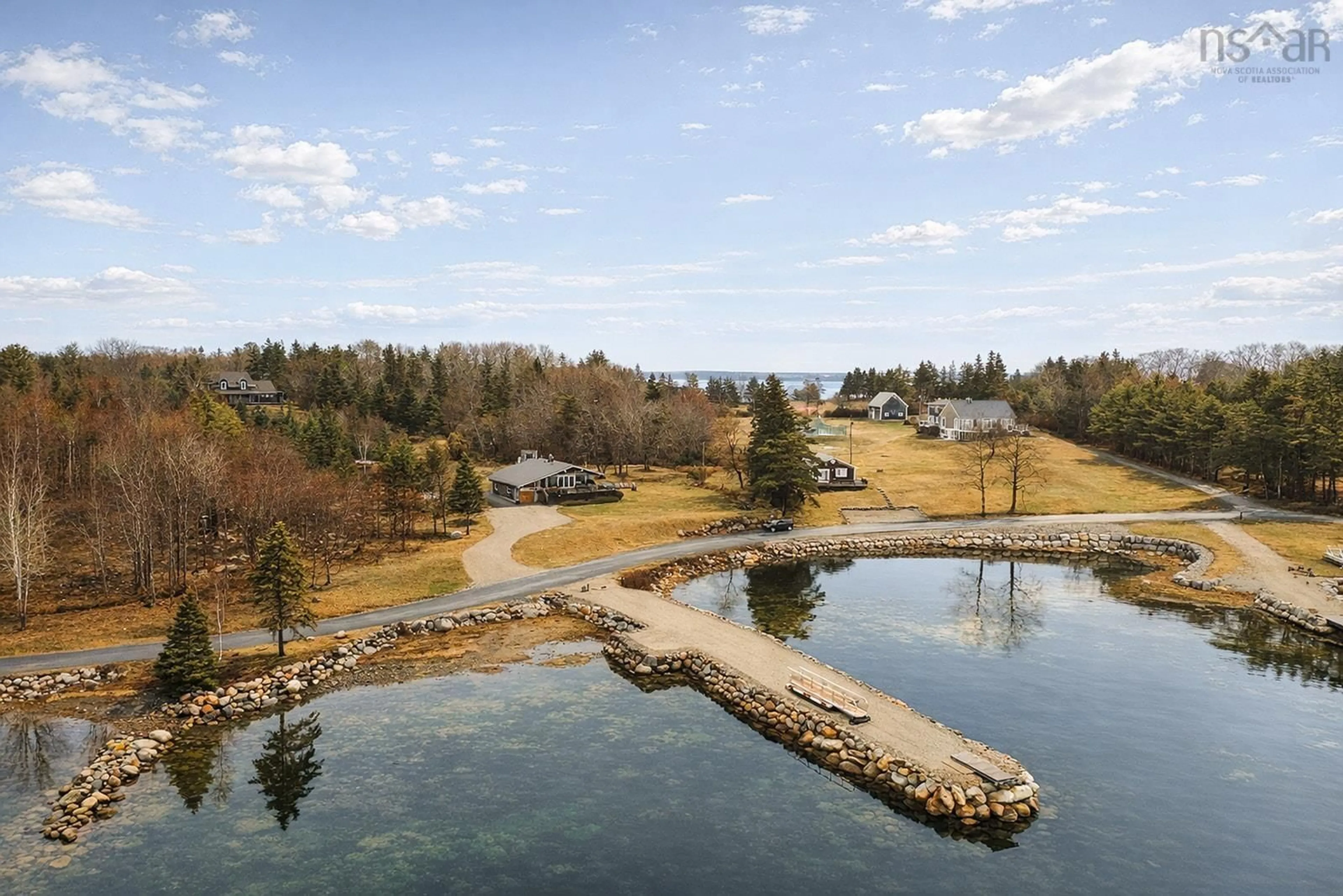 A pic from outside/outdoor area/front of a property/back of a property/a pic from drone, water/lake/river/ocean view for 435 Martins Point Rd, Martins Point Nova Scotia B0J 2E0