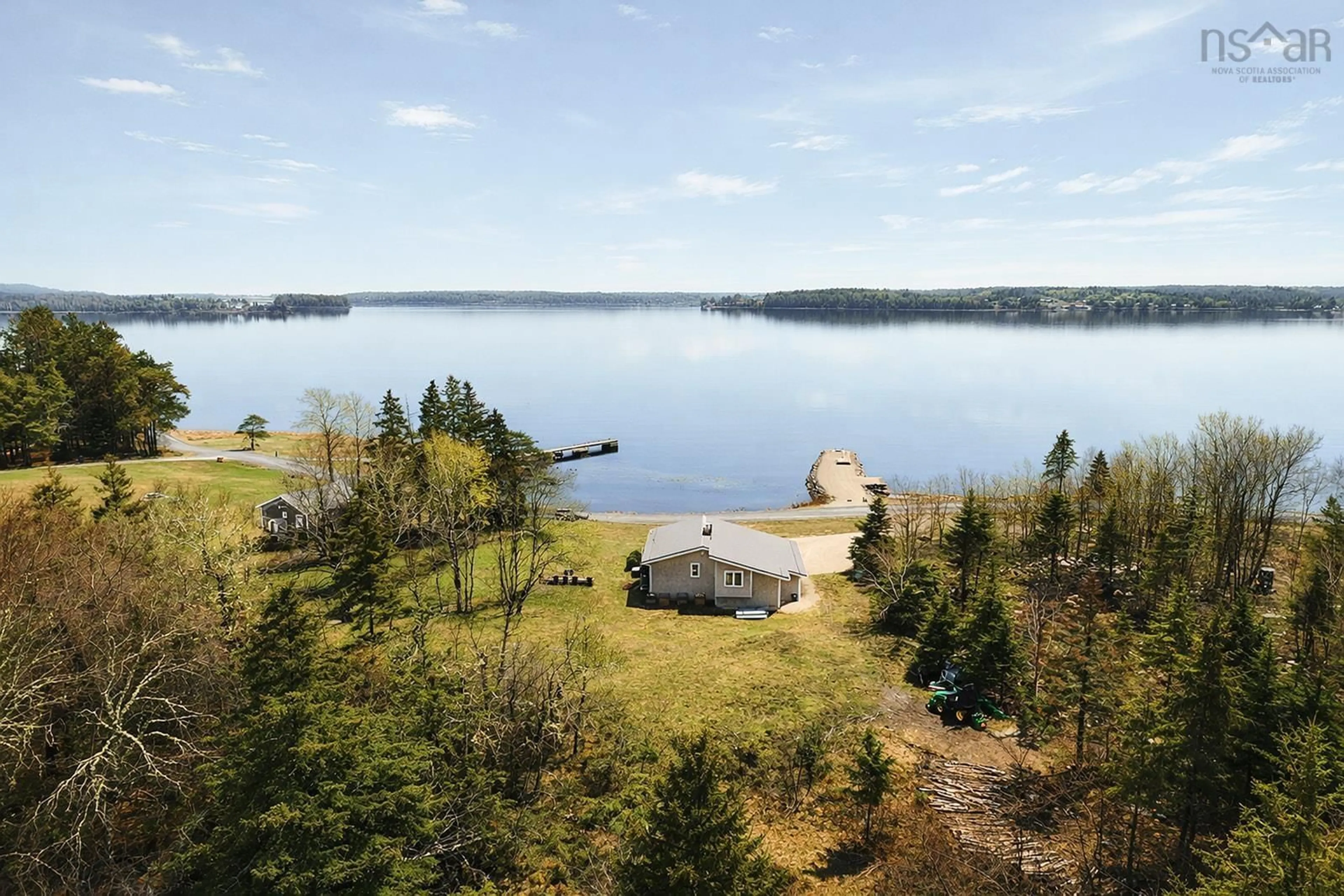 A pic from outside/outdoor area/front of a property/back of a property/a pic from drone, water/lake/river/ocean view for 435 Martins Point Rd, Martins Point Nova Scotia B0J 2E0
