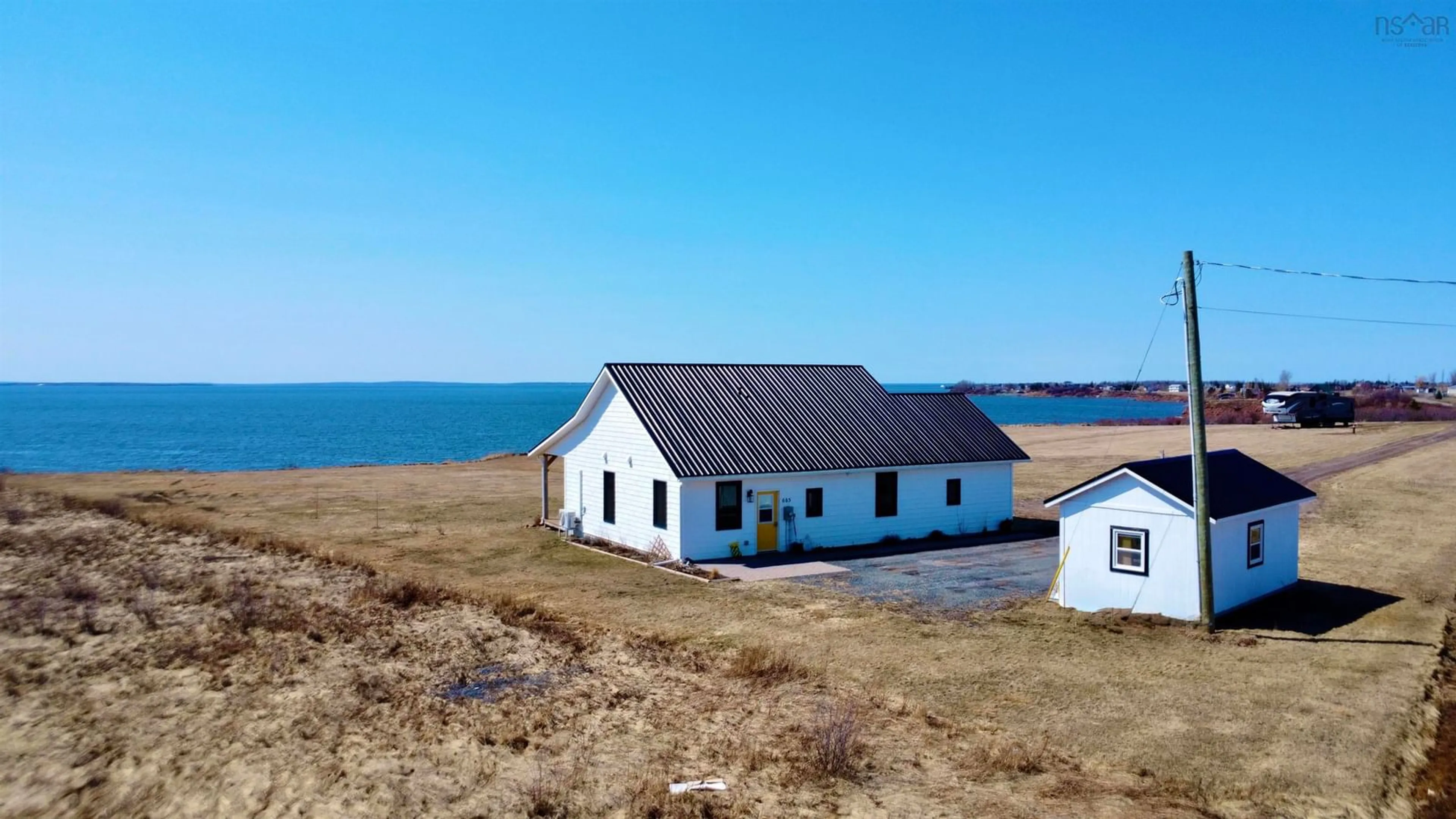 A pic from outside/outdoor area/front of a property/back of a property/a pic from drone, water/lake/river/ocean view for Cape John Road #685, Cape John Nova Scotia B0K 1N0