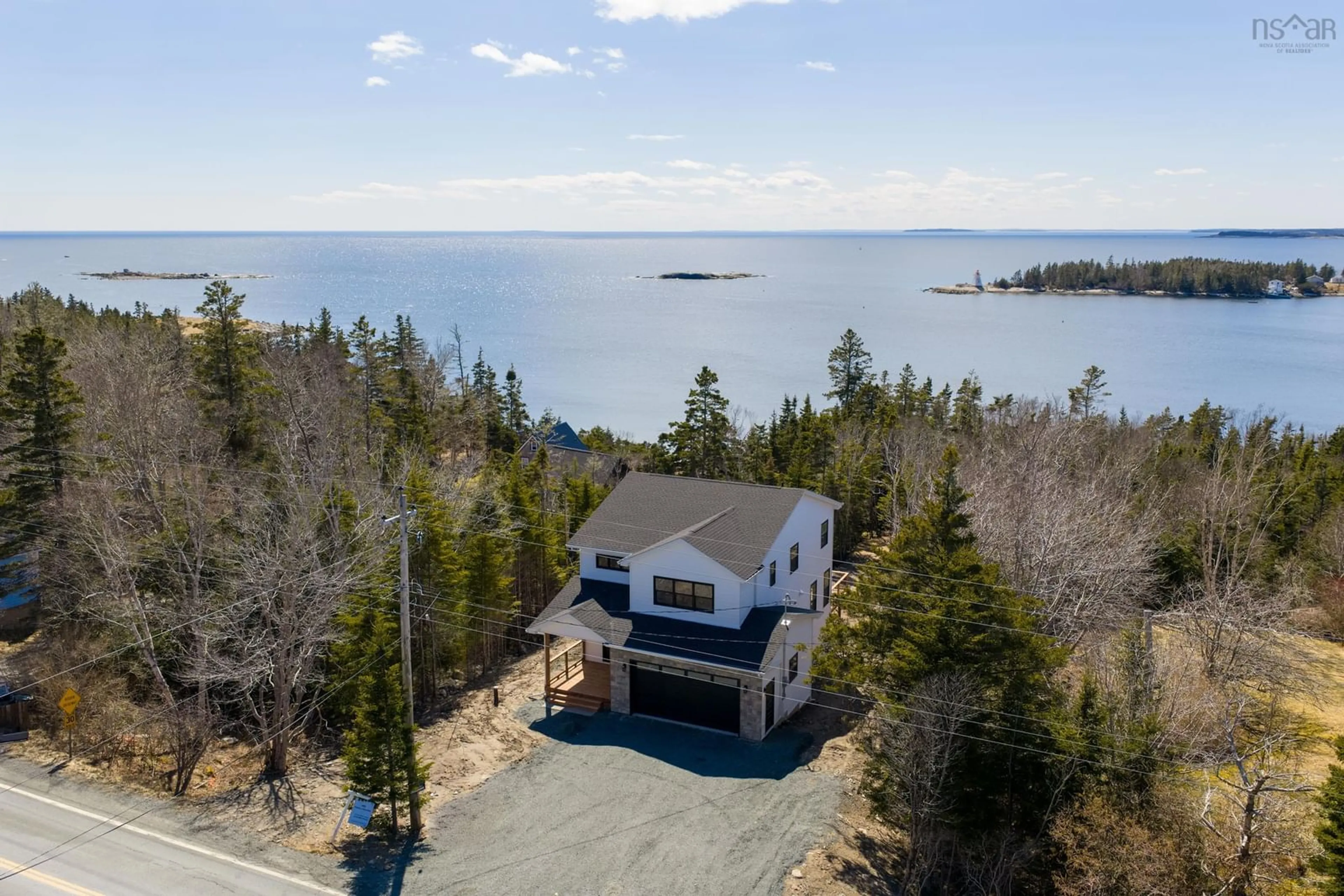 A pic from outside/outdoor area/front of a property/back of a property/a pic from drone, water/lake/river/ocean view for 8776 Peggys Cove Rd, Indian Harbour Nova Scotia B3Z 3P3