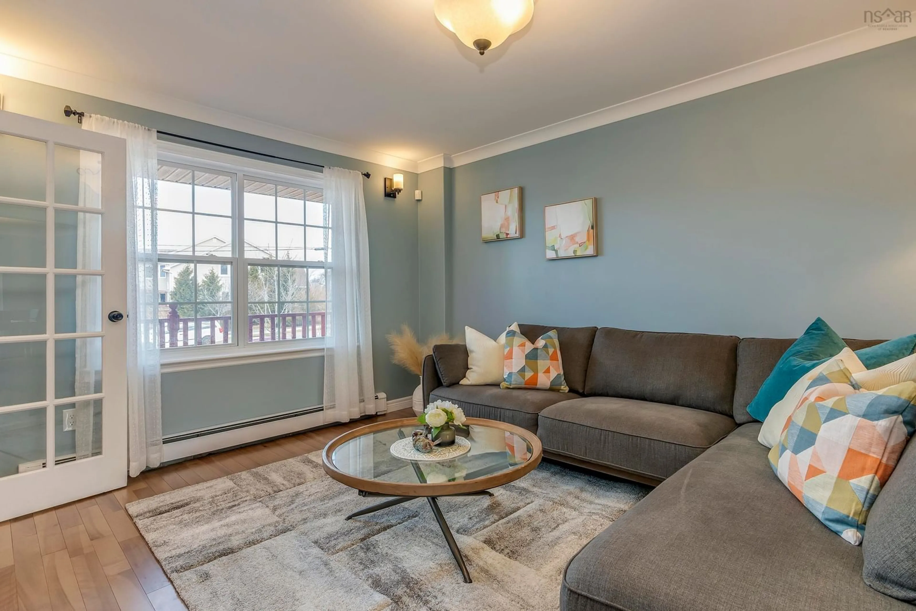 Living room with furniture, wood/laminate floor for 246 Langbrae Dr, Halifax Nova Scotia B3S 1K4