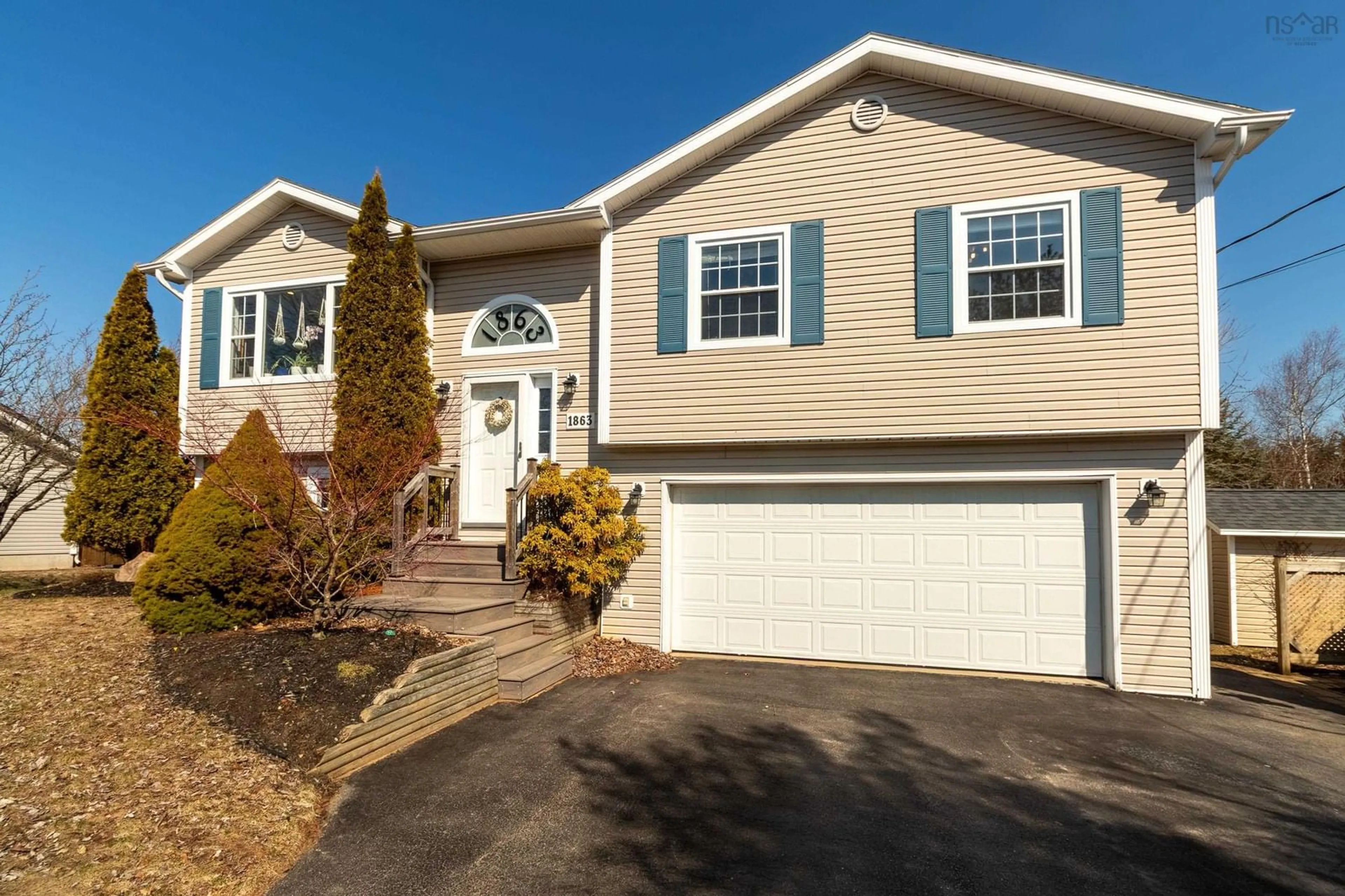 Home with vinyl exterior material, street for 1863 Acadia Dr, Kingston Nova Scotia B0P 1R0