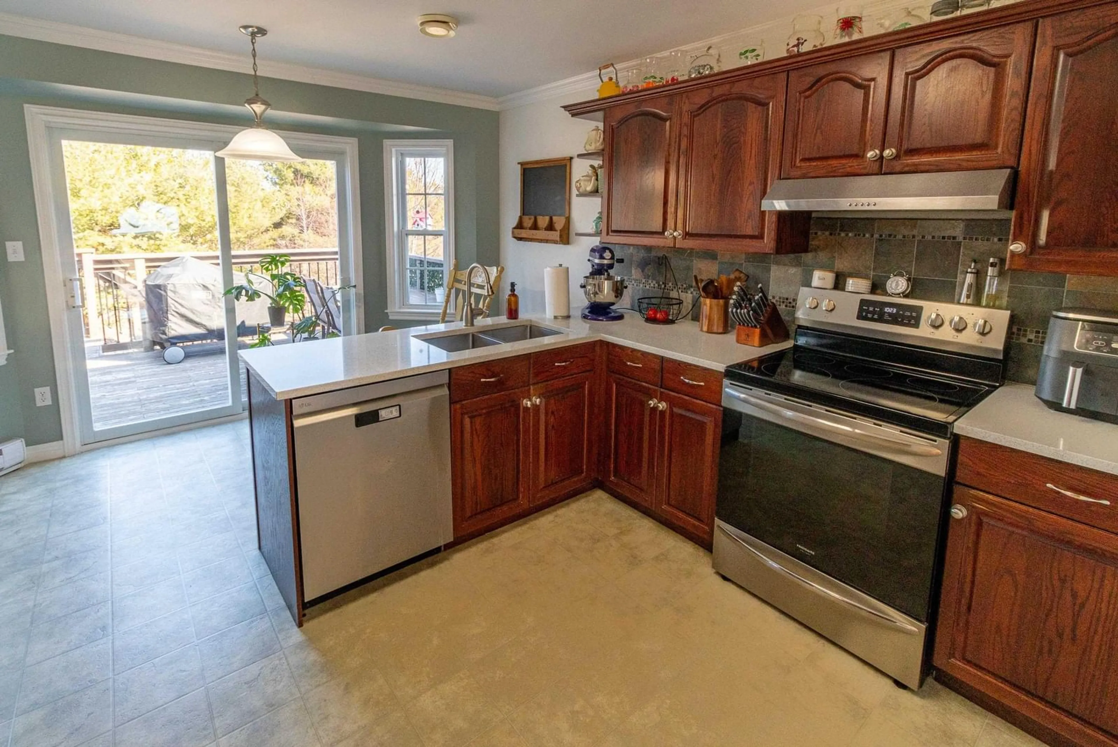 Open concept kitchen, ceramic/tile floor for 1863 Acadia Dr, Kingston Nova Scotia B0P 1R0