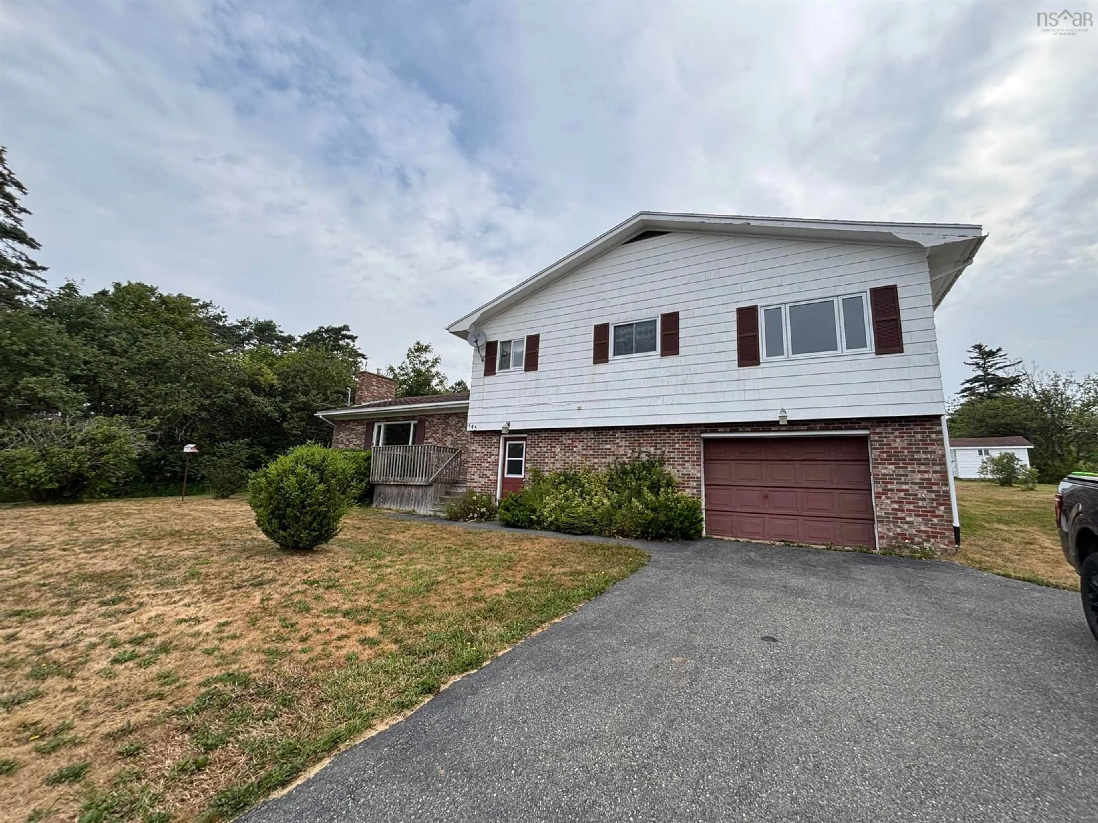 A pic from outside/outdoor area/front of a property/back of a property/a pic from drone, street for 445 Sandy Cove Rd, Sandy Cove Nova Scotia B0V 1E0