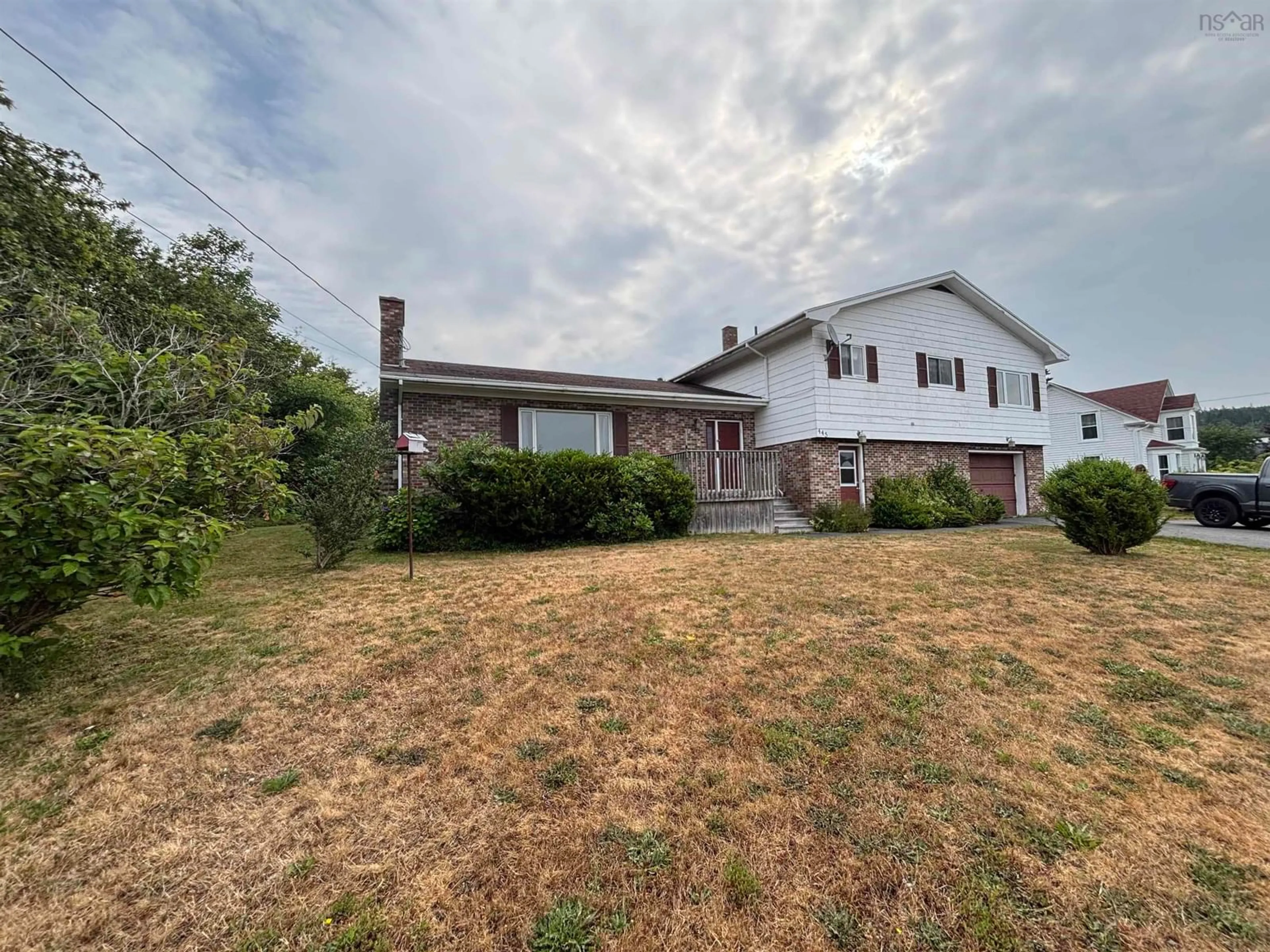 A pic from outside/outdoor area/front of a property/back of a property/a pic from drone, building for 445 Sandy Cove Rd, Sandy Cove Nova Scotia B0V 1E0