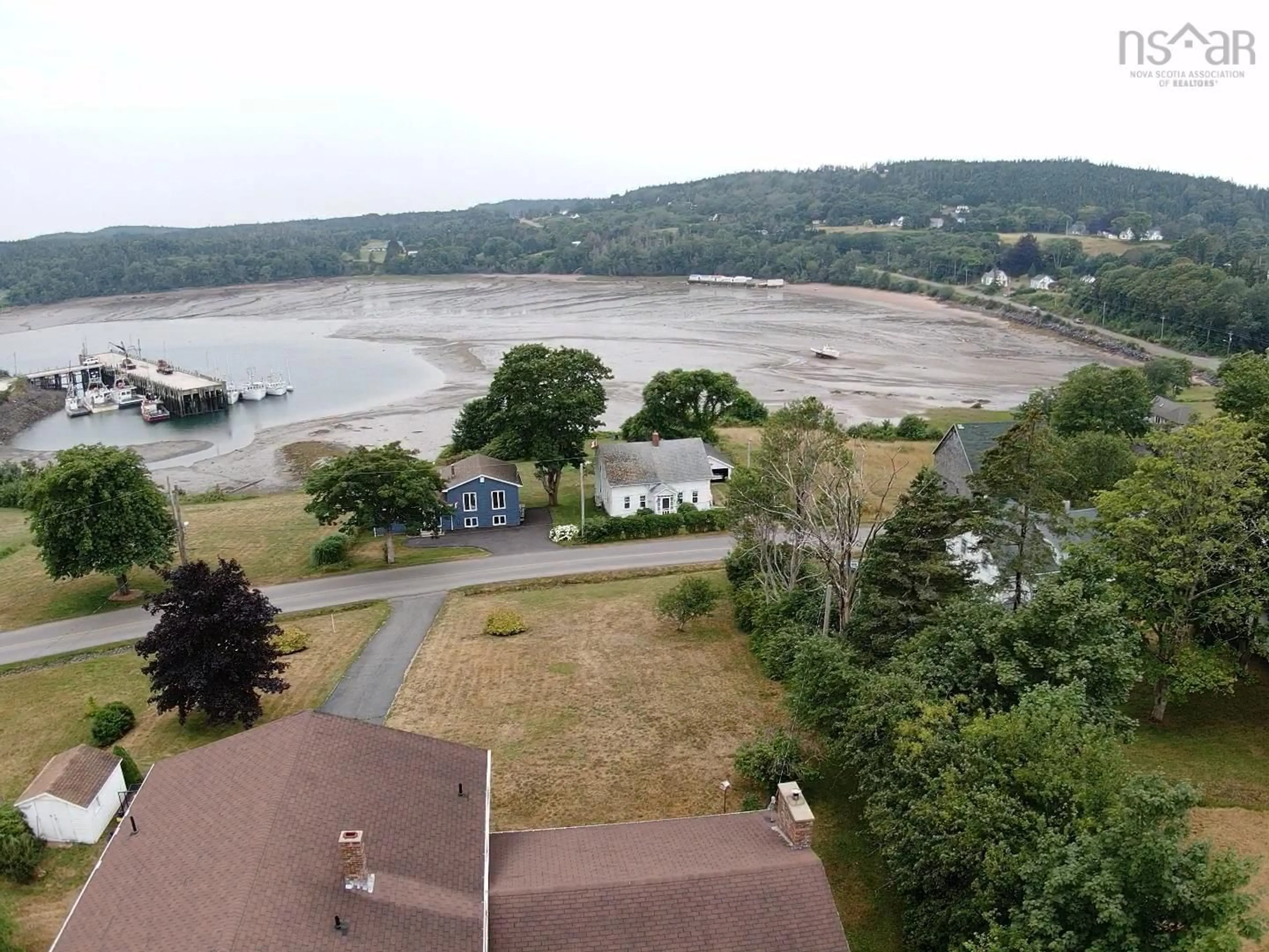 A pic from outside/outdoor area/front of a property/back of a property/a pic from drone, water/lake/river/ocean view for 445 Sandy Cove Rd, Sandy Cove Nova Scotia B0V 1E0