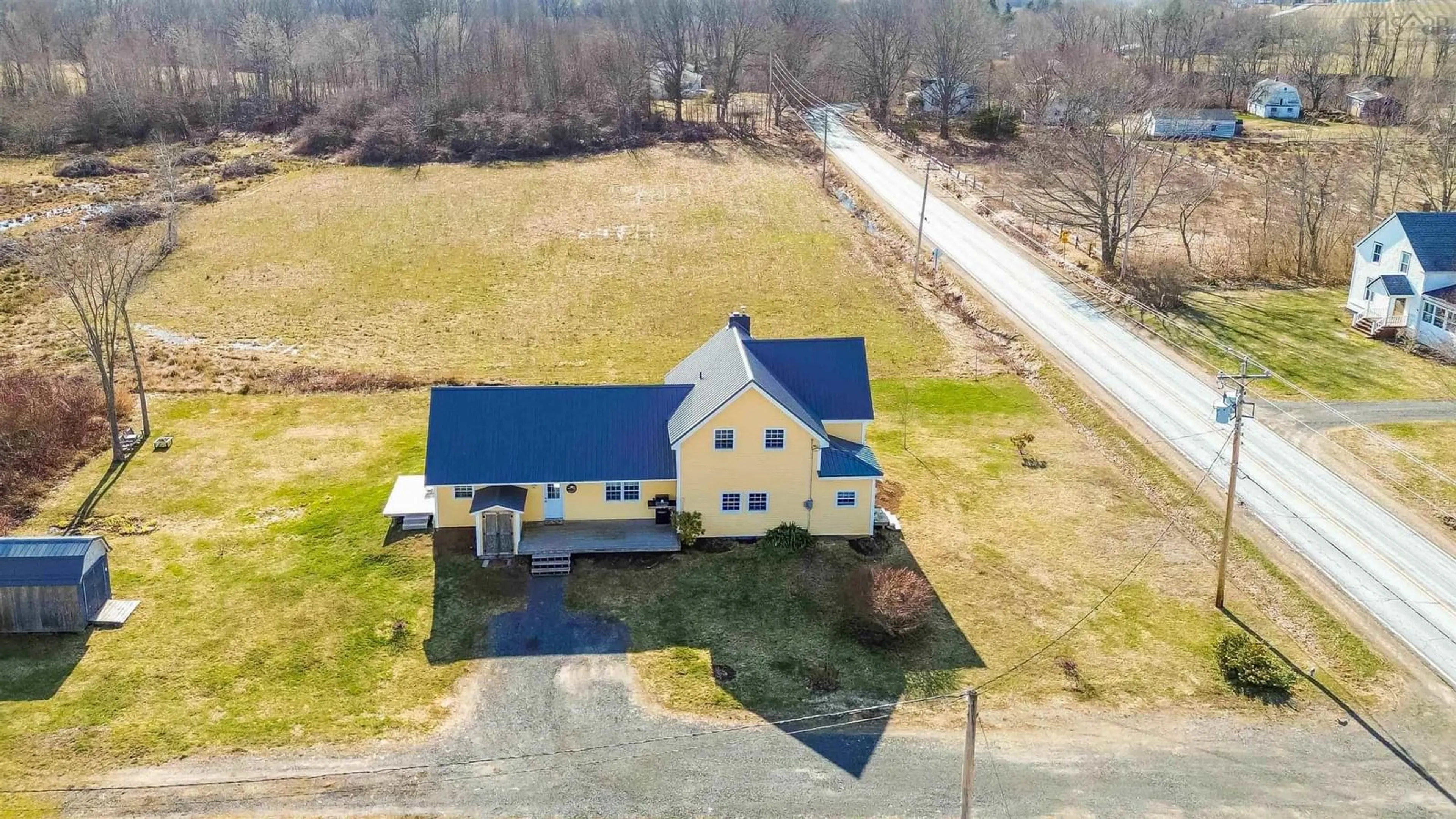 A pic from outside/outdoor area/front of a property/back of a property/a pic from drone, building for 5692 Highway 221, Woodville Nova Scotia B0P 1V0