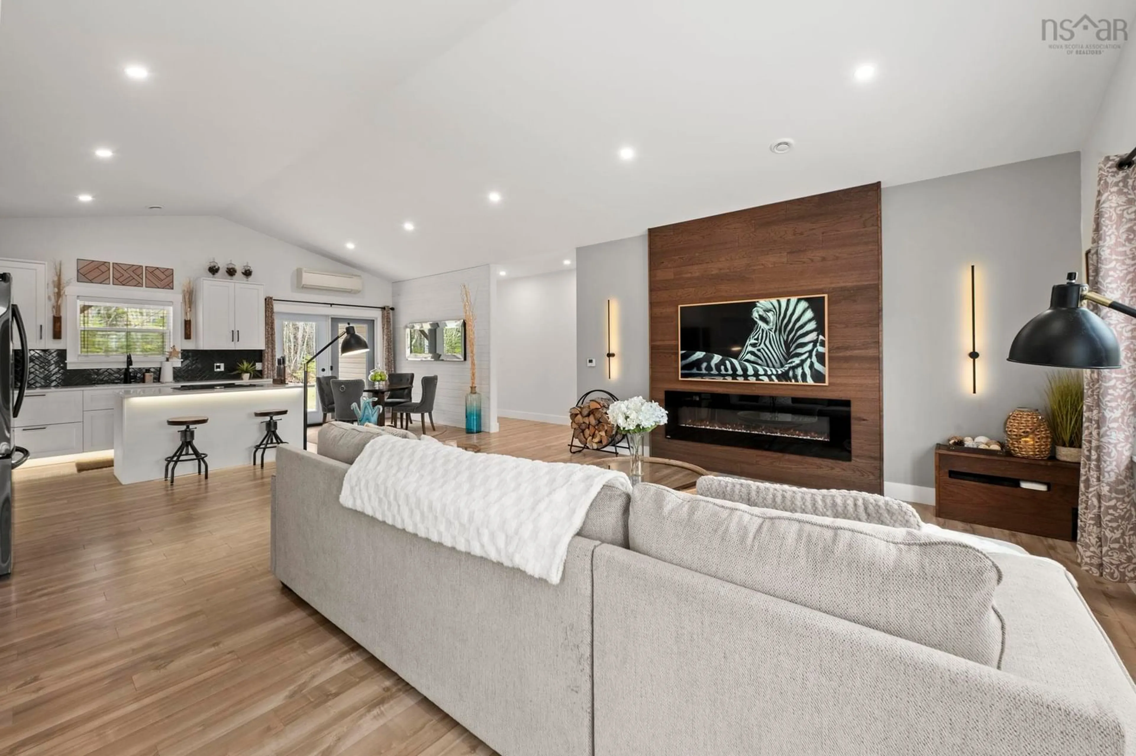 Living room with furniture, wood/laminate floor for 75 Muir Dr, Ellershouse Nova Scotia B0N 2A0