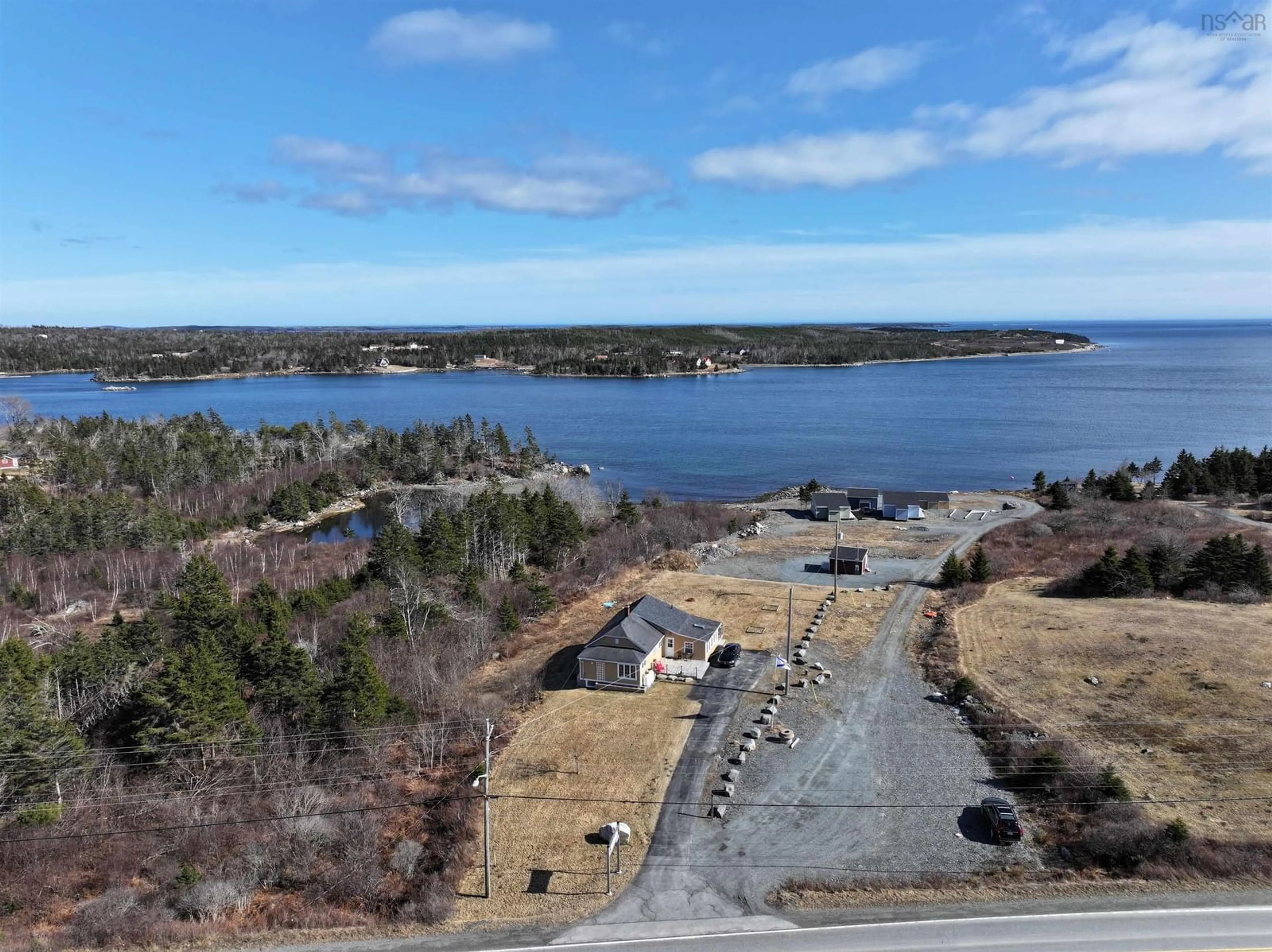 A pic from outside/outdoor area/front of a property/back of a property/a pic from drone, water/lake/river/ocean view for 19194 Highway 7, Spry Harbour Nova Scotia B0J 3H0