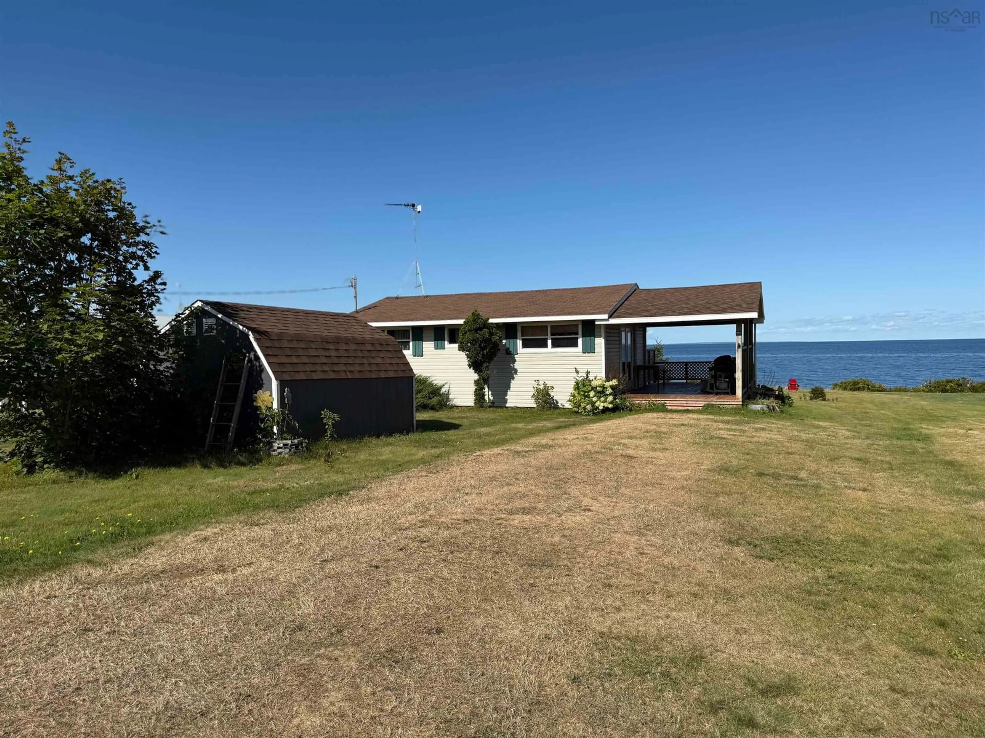 A pic from outside/outdoor area/front of a property/back of a property/a pic from drone, water/lake/river/ocean view for 113 Ceilidh Lane, Lismore Nova Scotia B0K 1B0