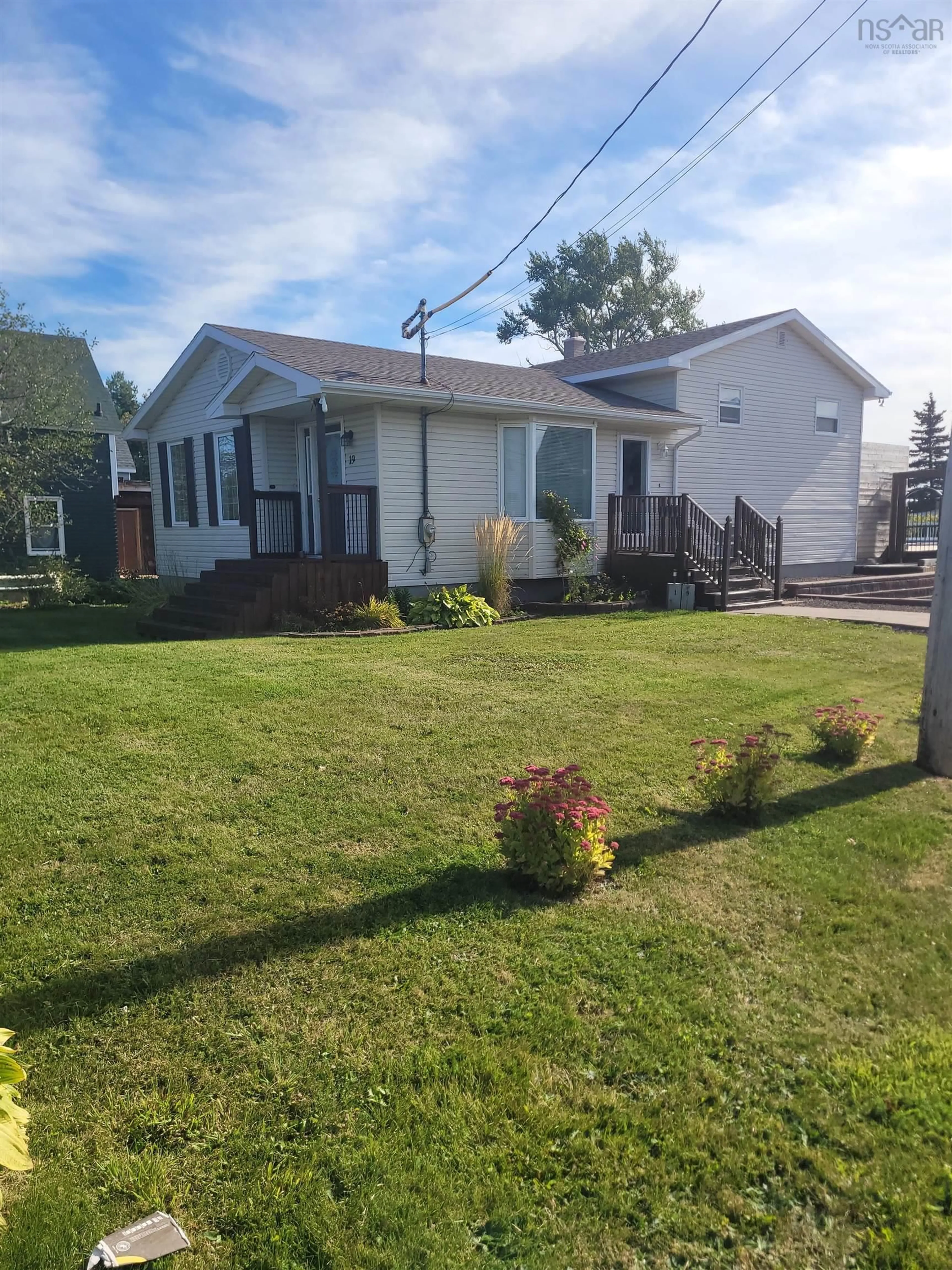 Home with vinyl exterior material, street for 19 Highland St, Glace Bay Nova Scotia B1A 2T4