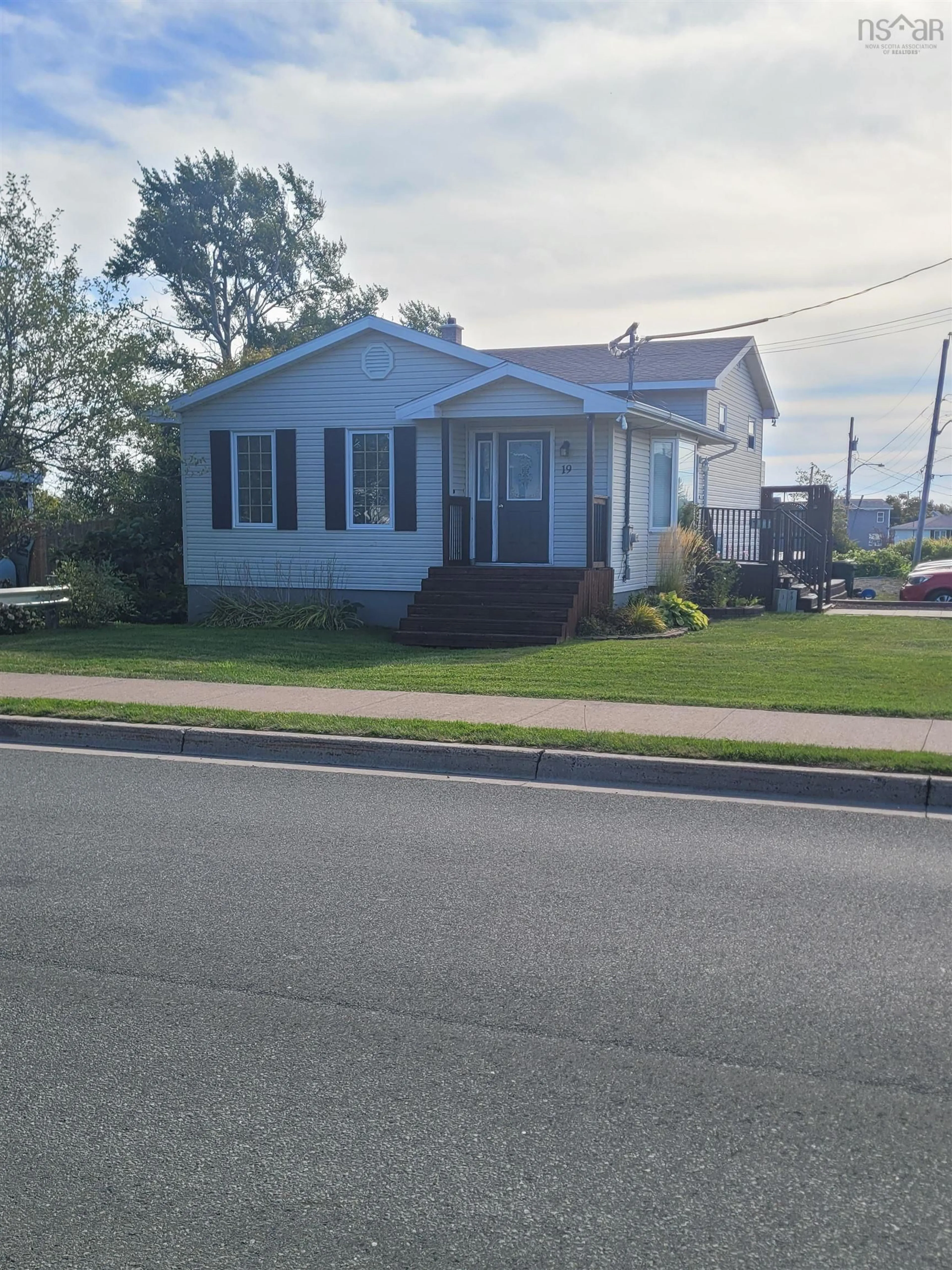 Home with vinyl exterior material, street for 19 Highland St, Glace Bay Nova Scotia B1A 2T4