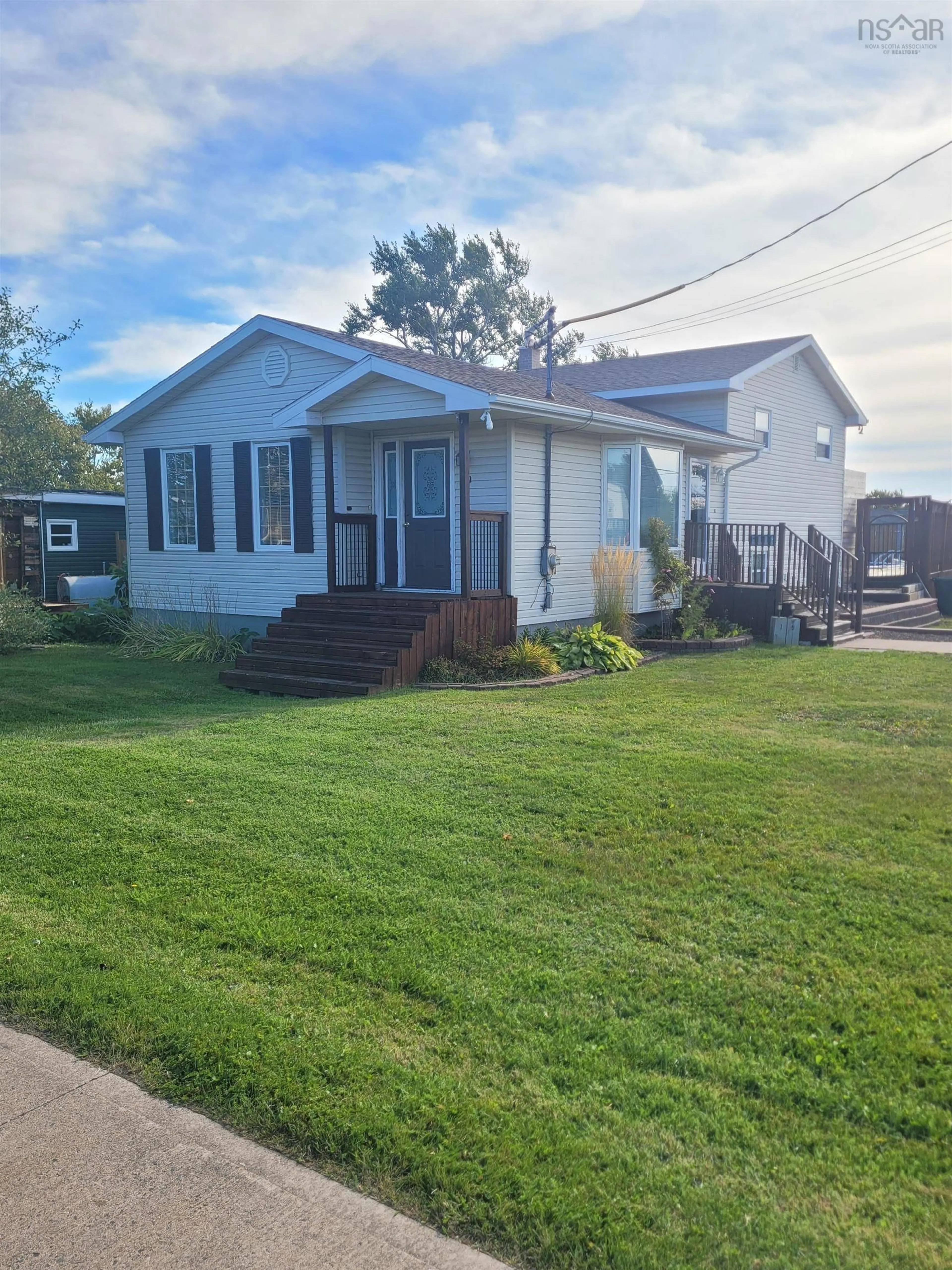 Home with vinyl exterior material, street for 19 Highland St, Glace Bay Nova Scotia B1A 2T4