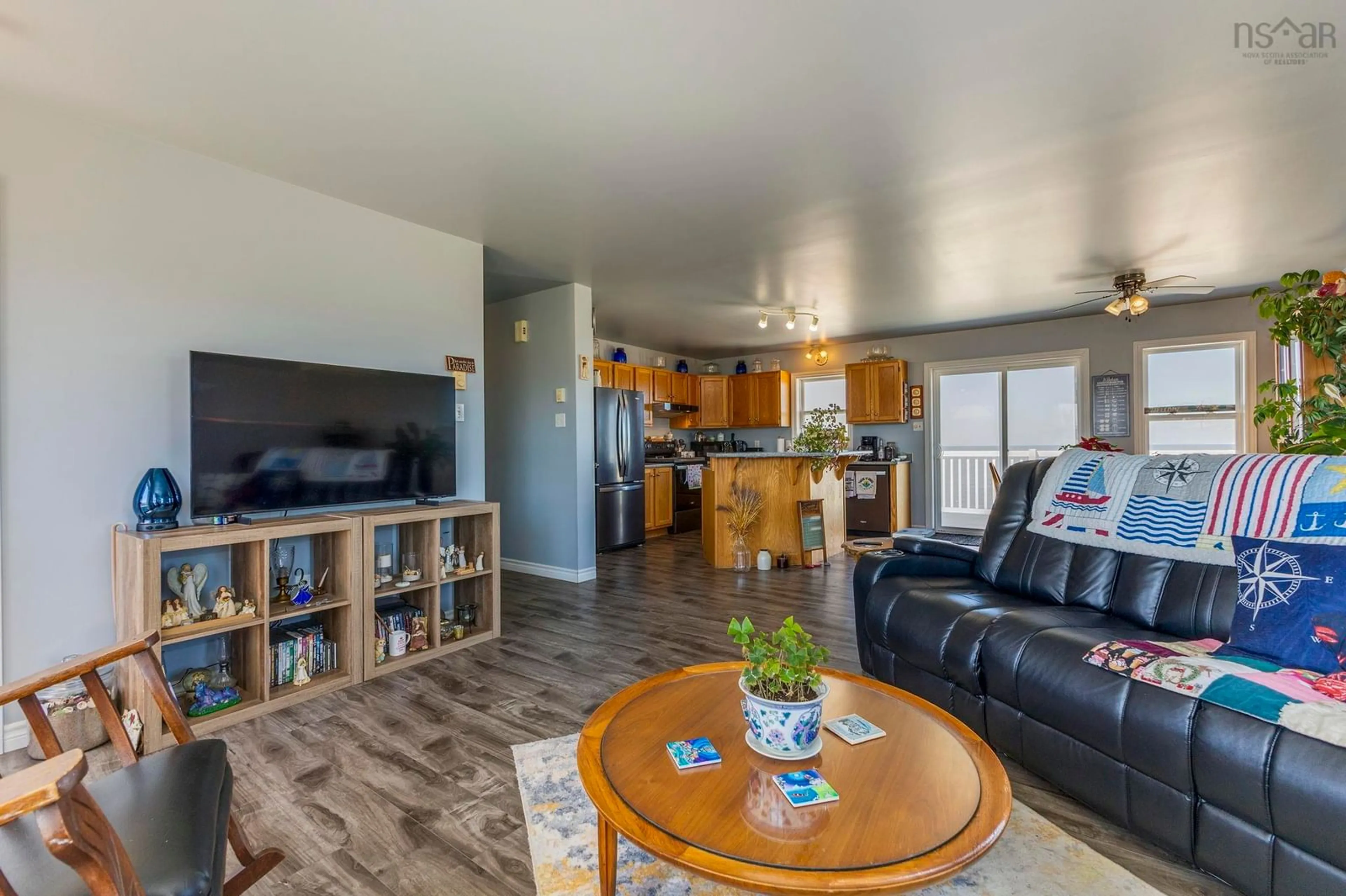 Living room with furniture, wood/laminate floor for 22 Dawson Dr, Ponds Nova Scotia B0K 1G0