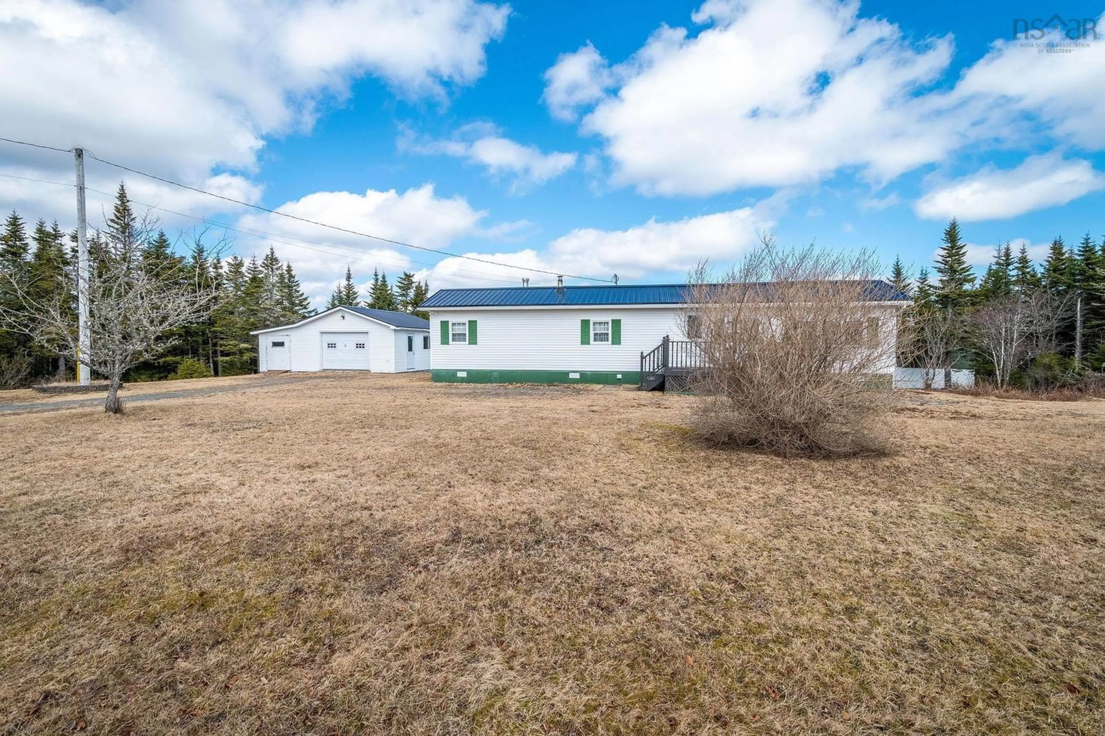 A pic from outside/outdoor area/front of a property/back of a property/a pic from drone, unknown for 4609 Highway 211, Port Bickerton Nova Scotia B0J 1A0