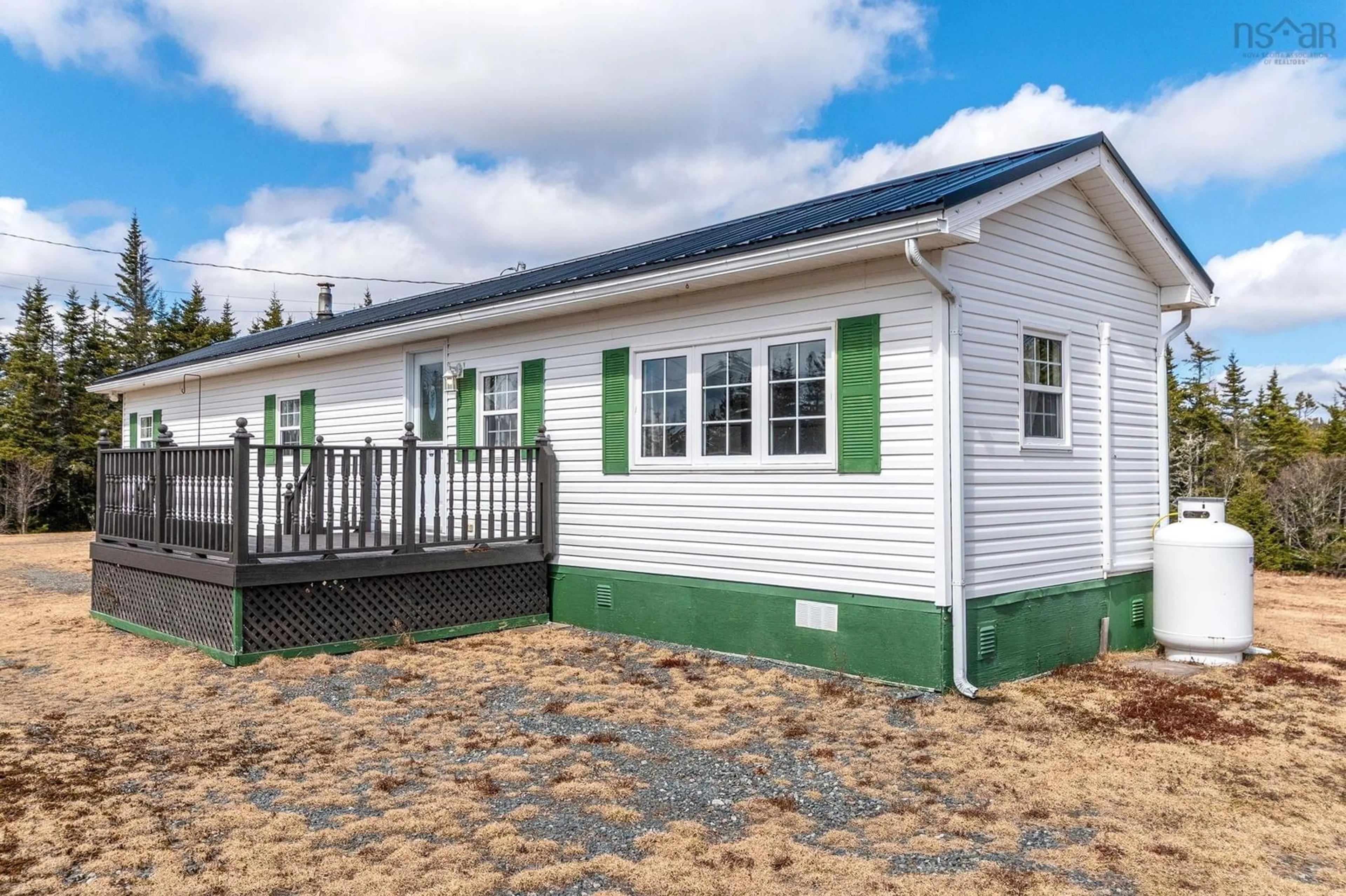 Home with vinyl exterior material, street for 4609 Highway 211, Port Bickerton Nova Scotia B0J 1A0