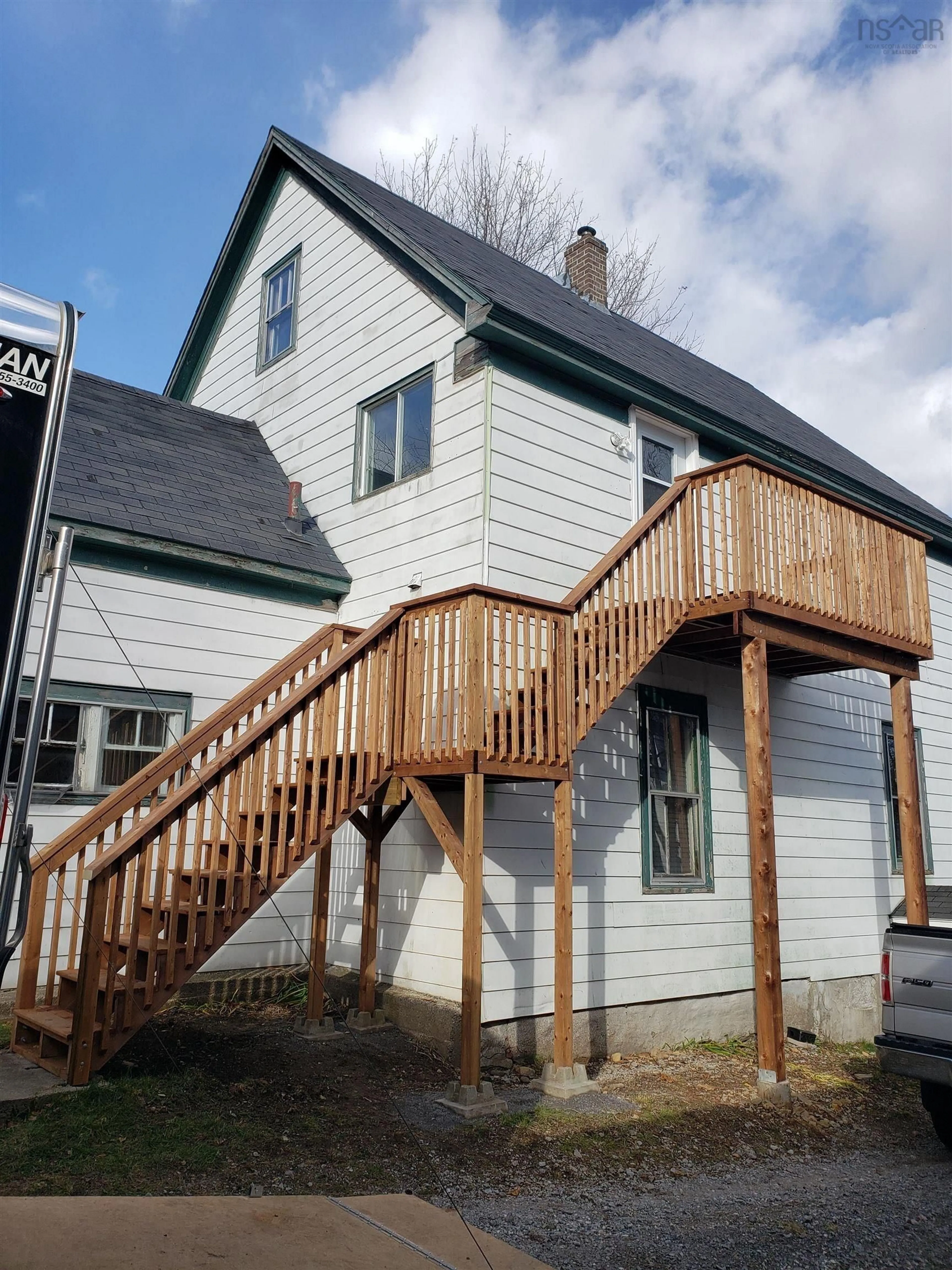 Home with vinyl exterior material, street for 64 Archibald Ave, North Sydney Nova Scotia B2A 2X1