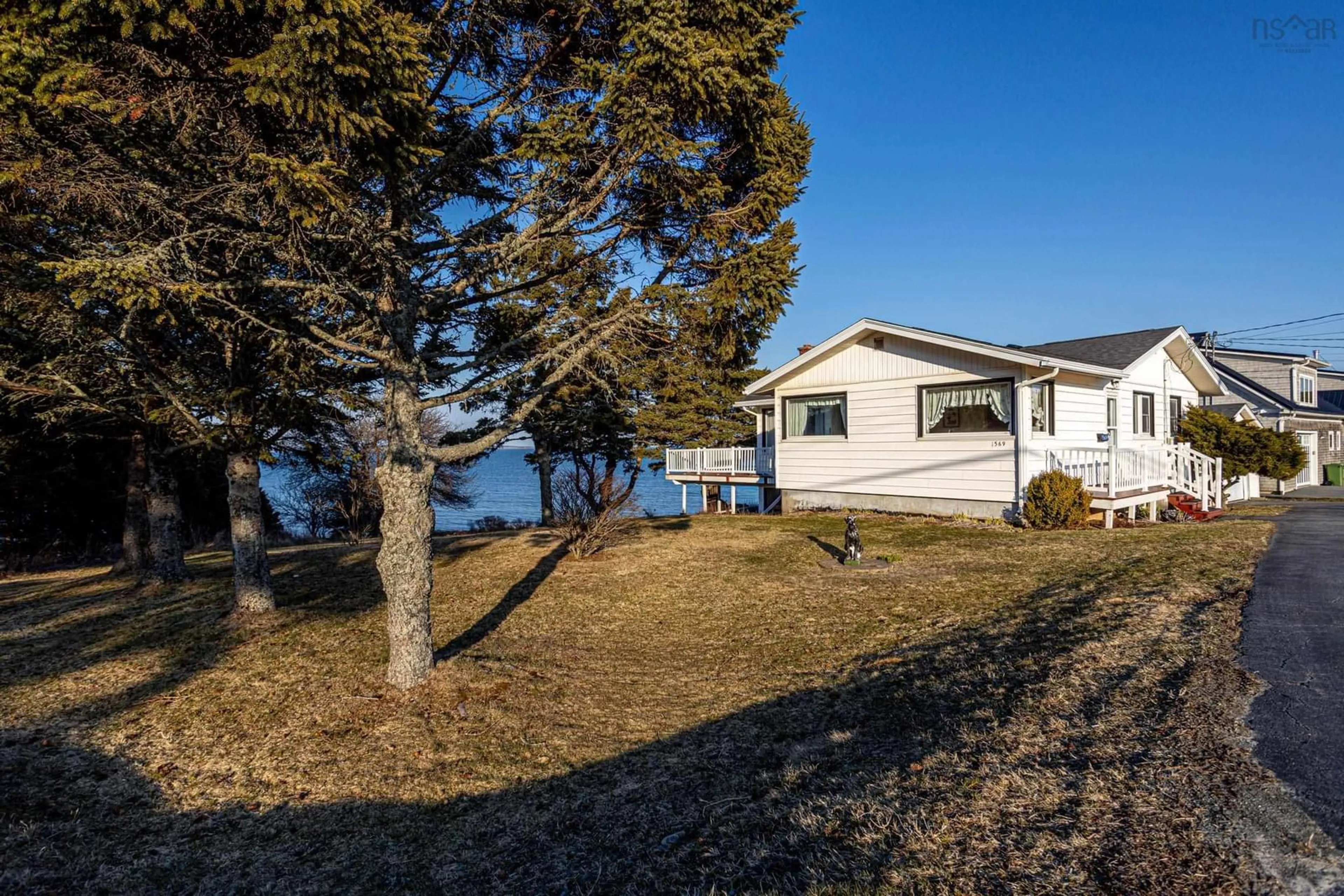 A pic from outside/outdoor area/front of a property/back of a property/a pic from drone, water/lake/river/ocean view for 1569 Cow Bay Rd, Cow Bay Nova Scotia B3G 1L3