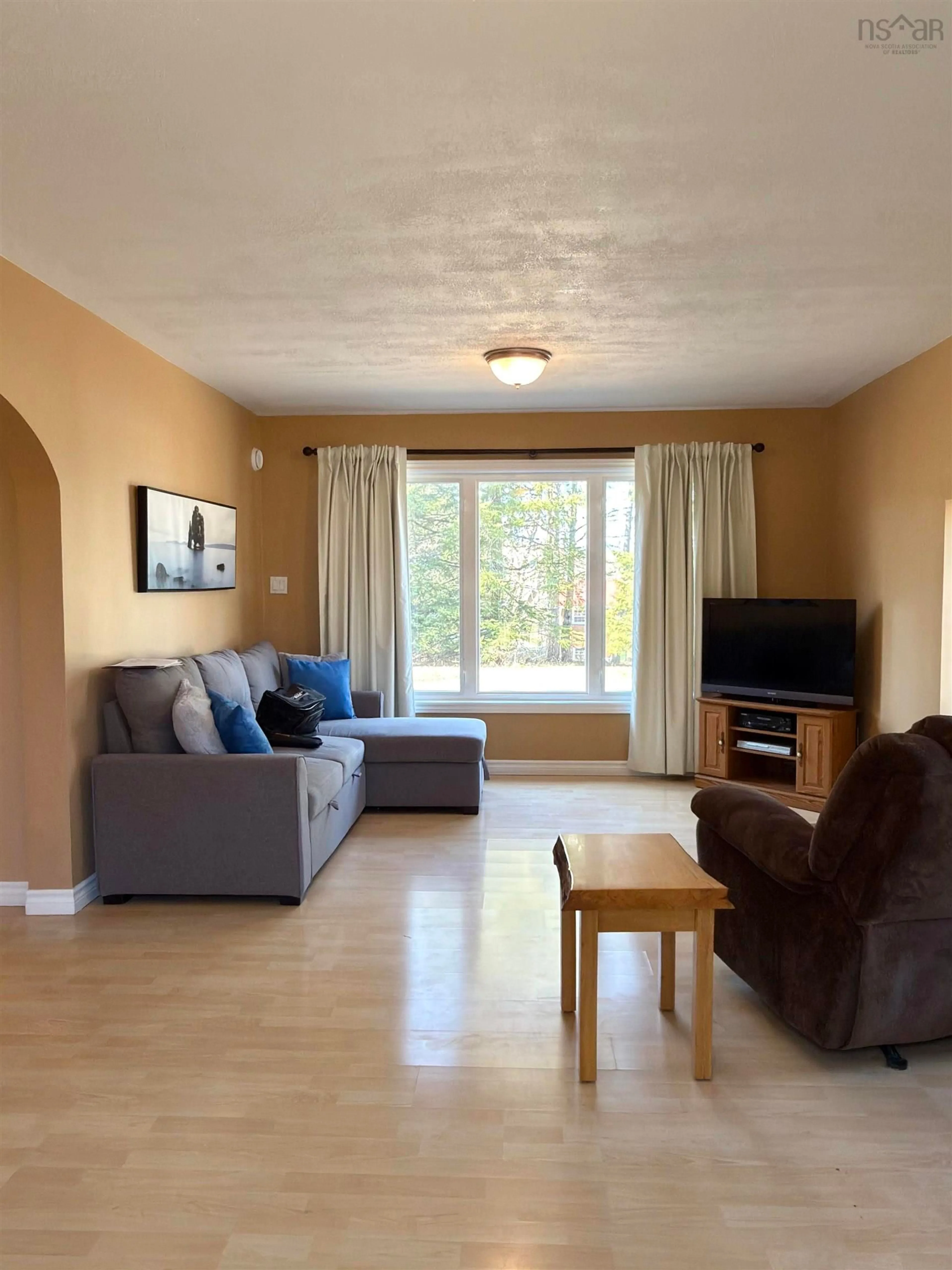 Living room with furniture, wood/laminate floor for 199 Green Hill Rd, Alma Nova Scotia B0K 2A0