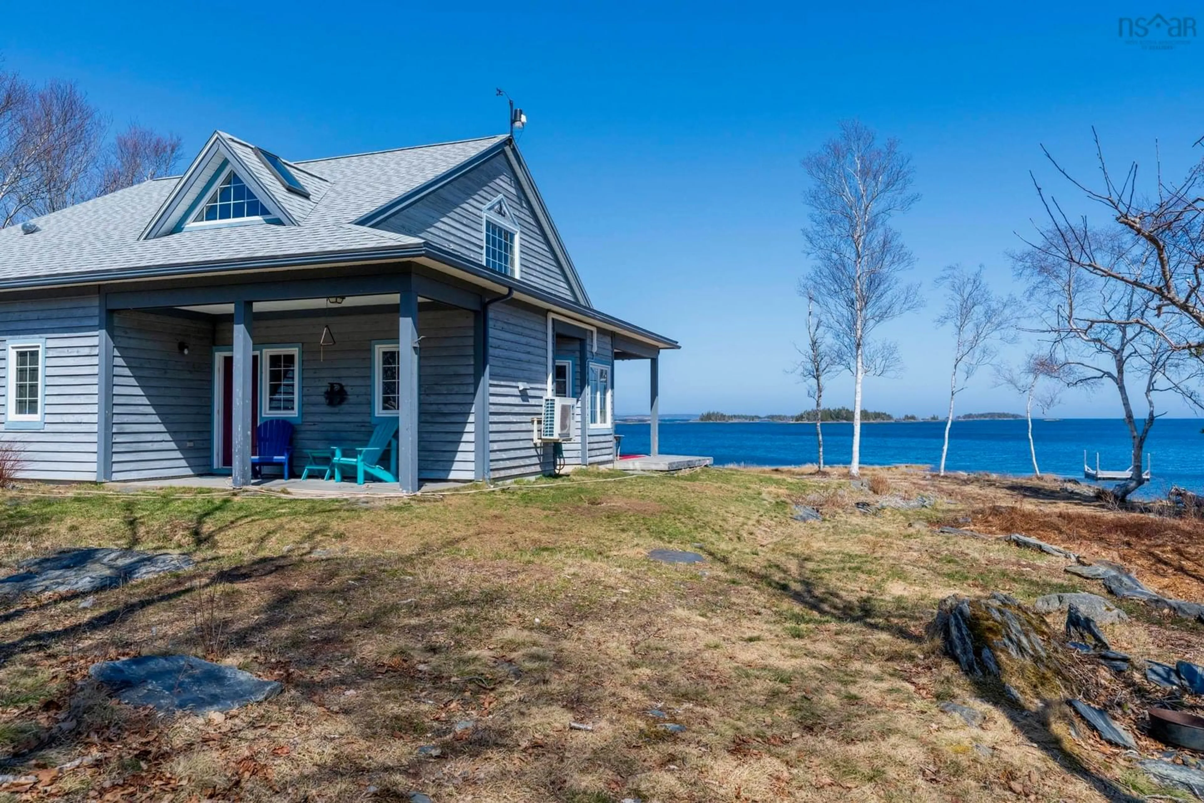 A pic from outside/outdoor area/front of a property/back of a property/a pic from drone, water/lake/river/ocean view for 139 Pine Dr, Heckmans Island Nova Scotia B0J 2C0
