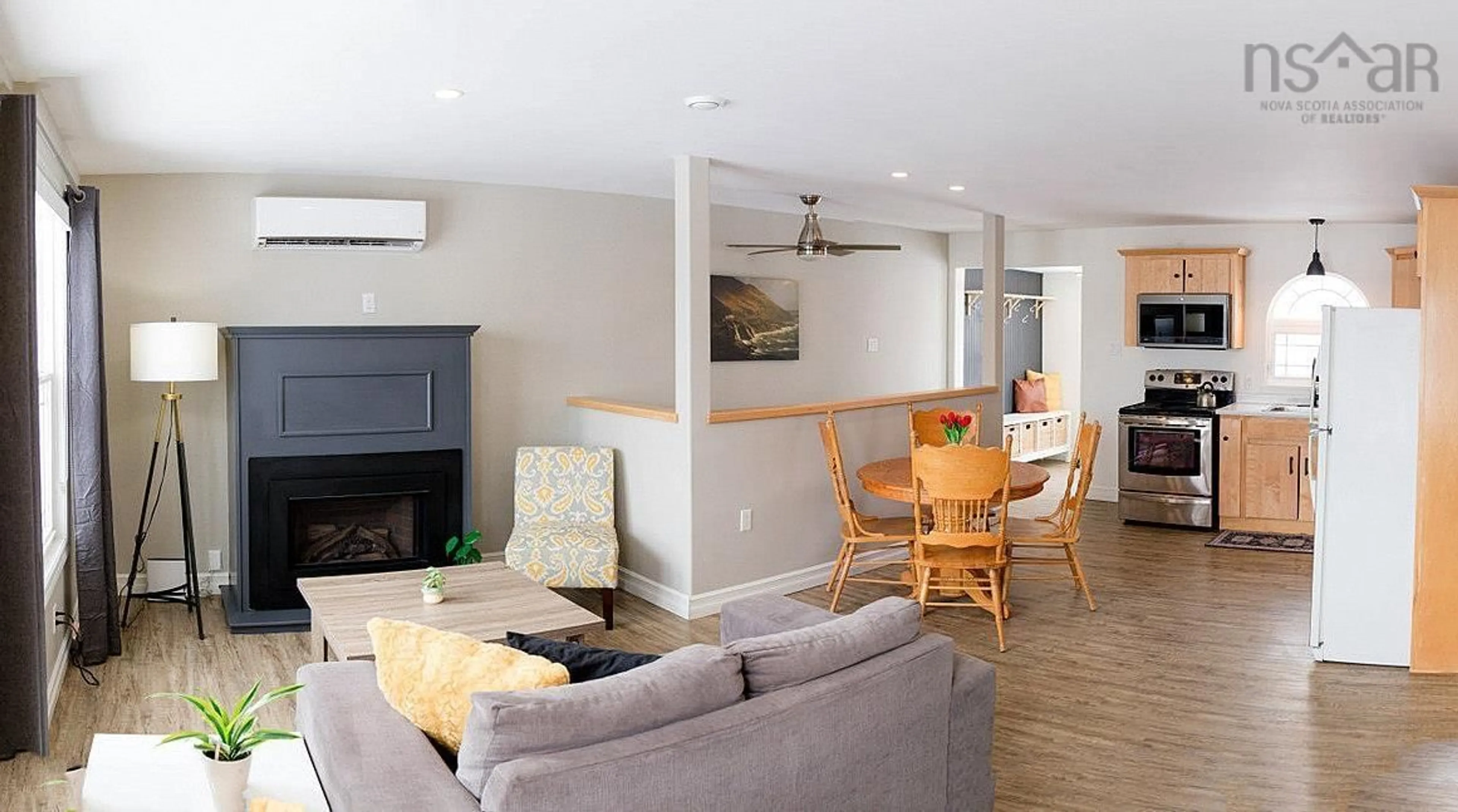 Living room with furniture, wood/laminate floor for 84 Forest St, Inverness Nova Scotia B0E 1N0