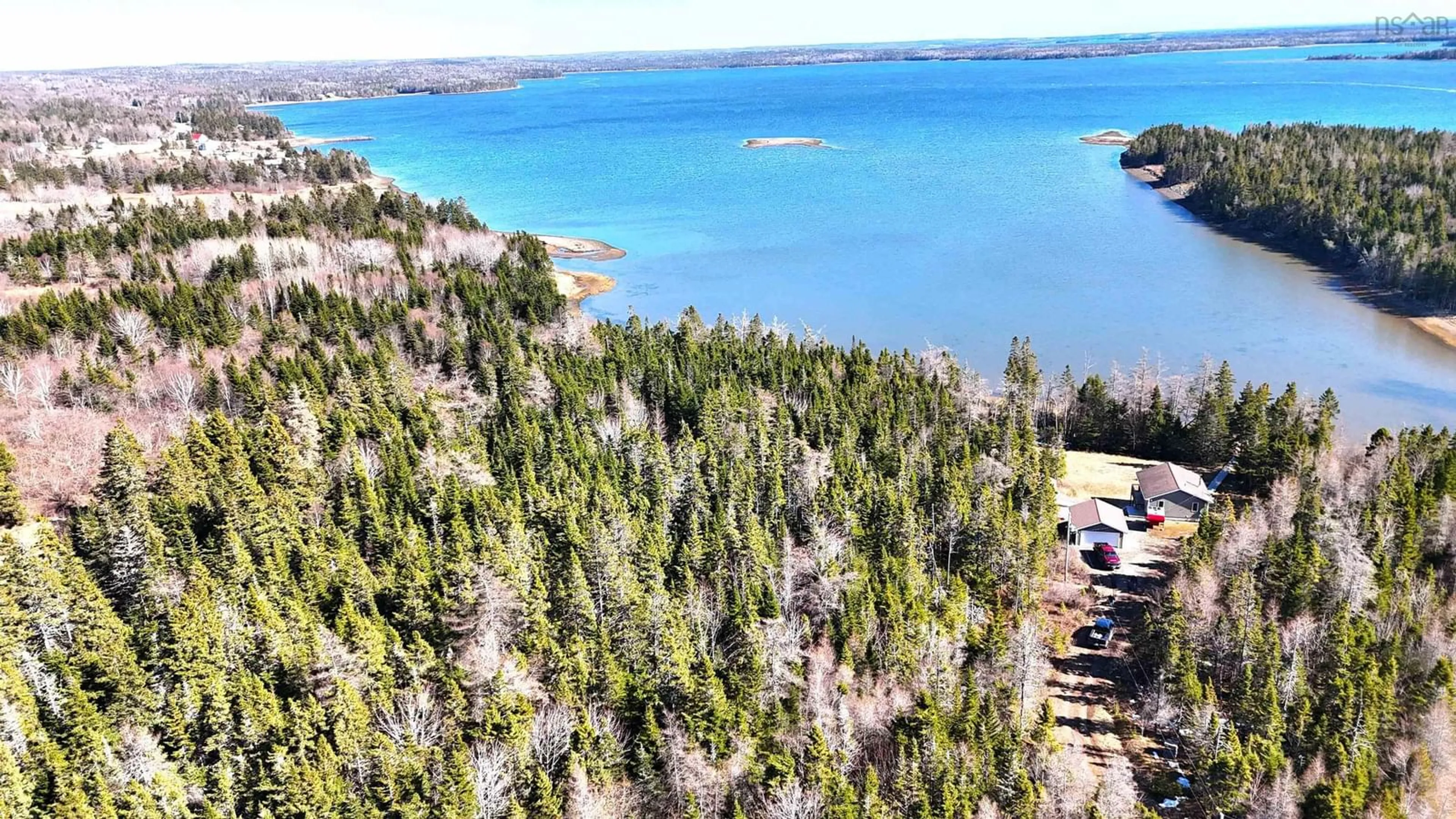A pic from outside/outdoor area/front of a property/back of a property/a pic from drone, water/lake/river/ocean view for 11 Kelly Lane, Walkerville Nova Scotia B0E 1J0