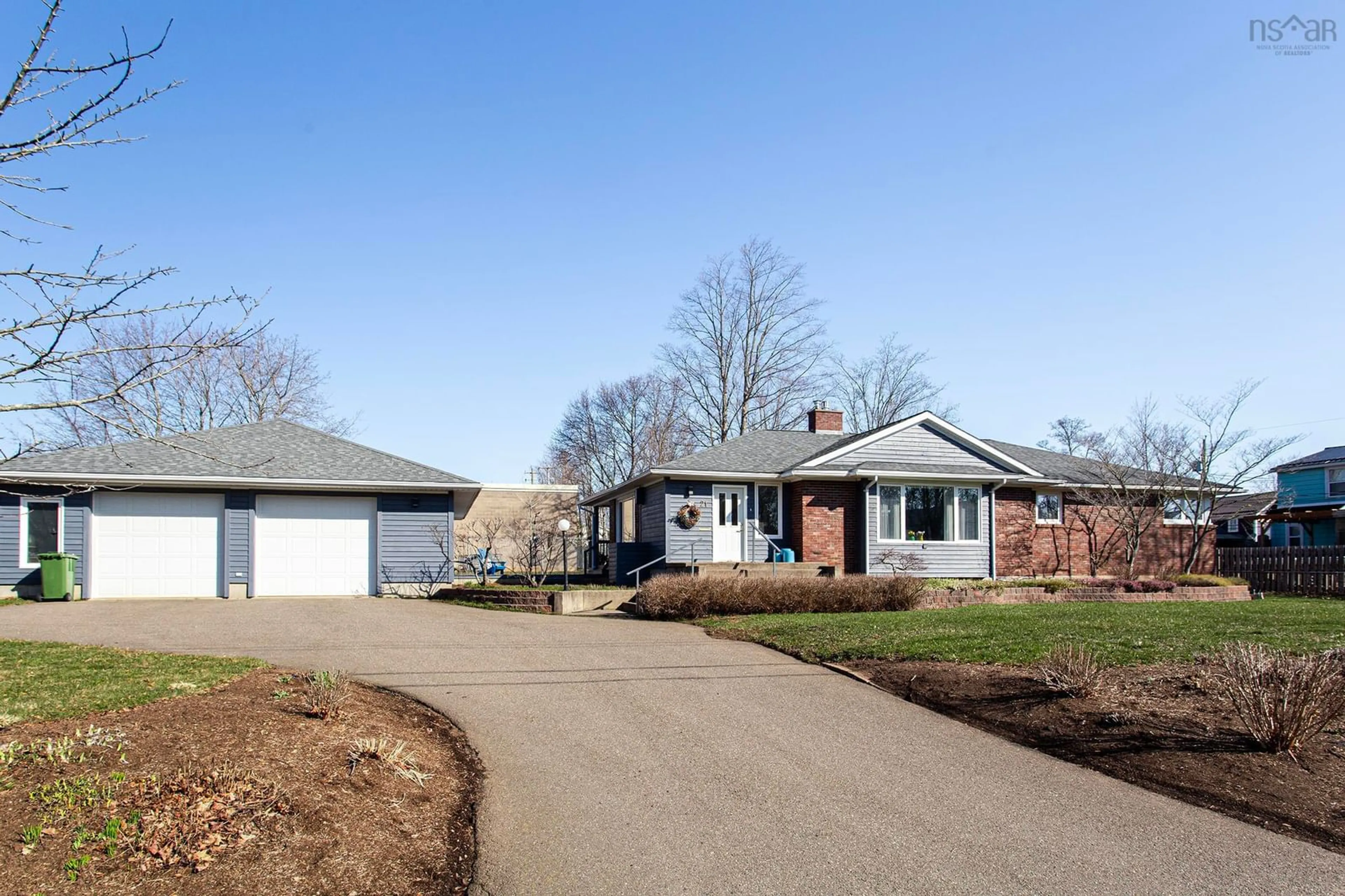Home with brick exterior material, street for 21 Spring Garden Rd, Middleton Nova Scotia B0S 1P0