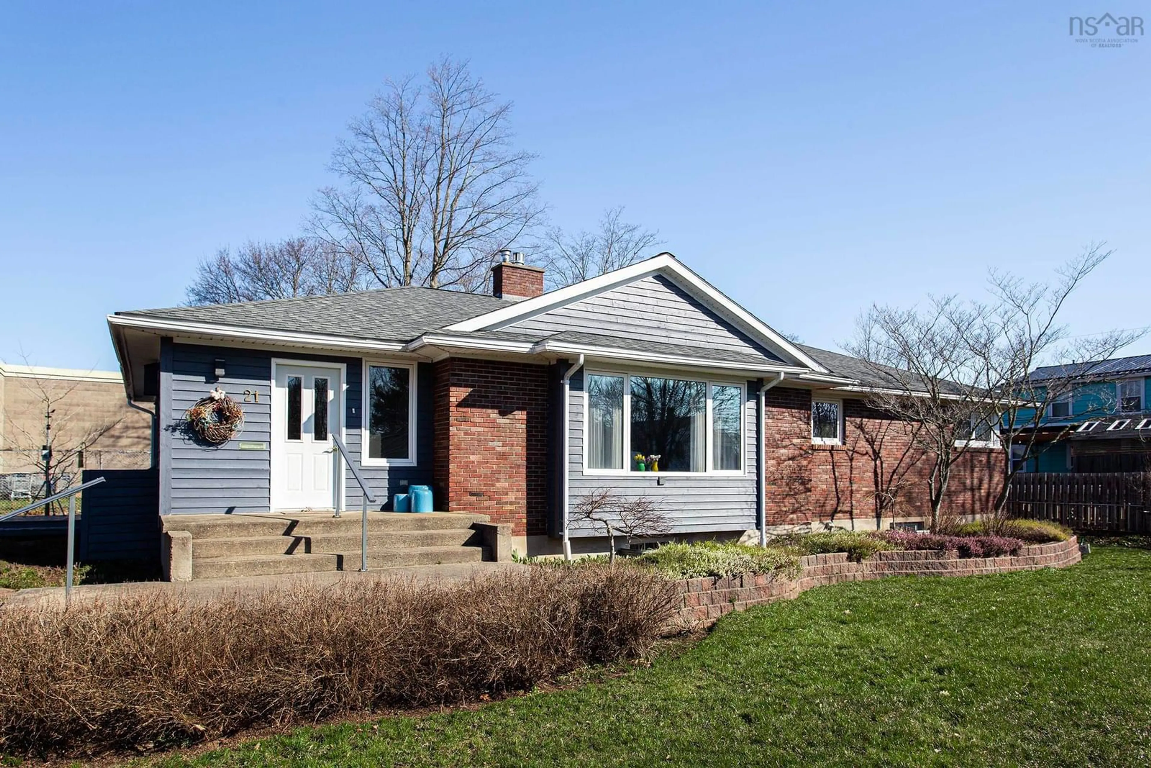 Home with brick exterior material, street for 21 Spring Garden Rd, Middleton Nova Scotia B0S 1P0