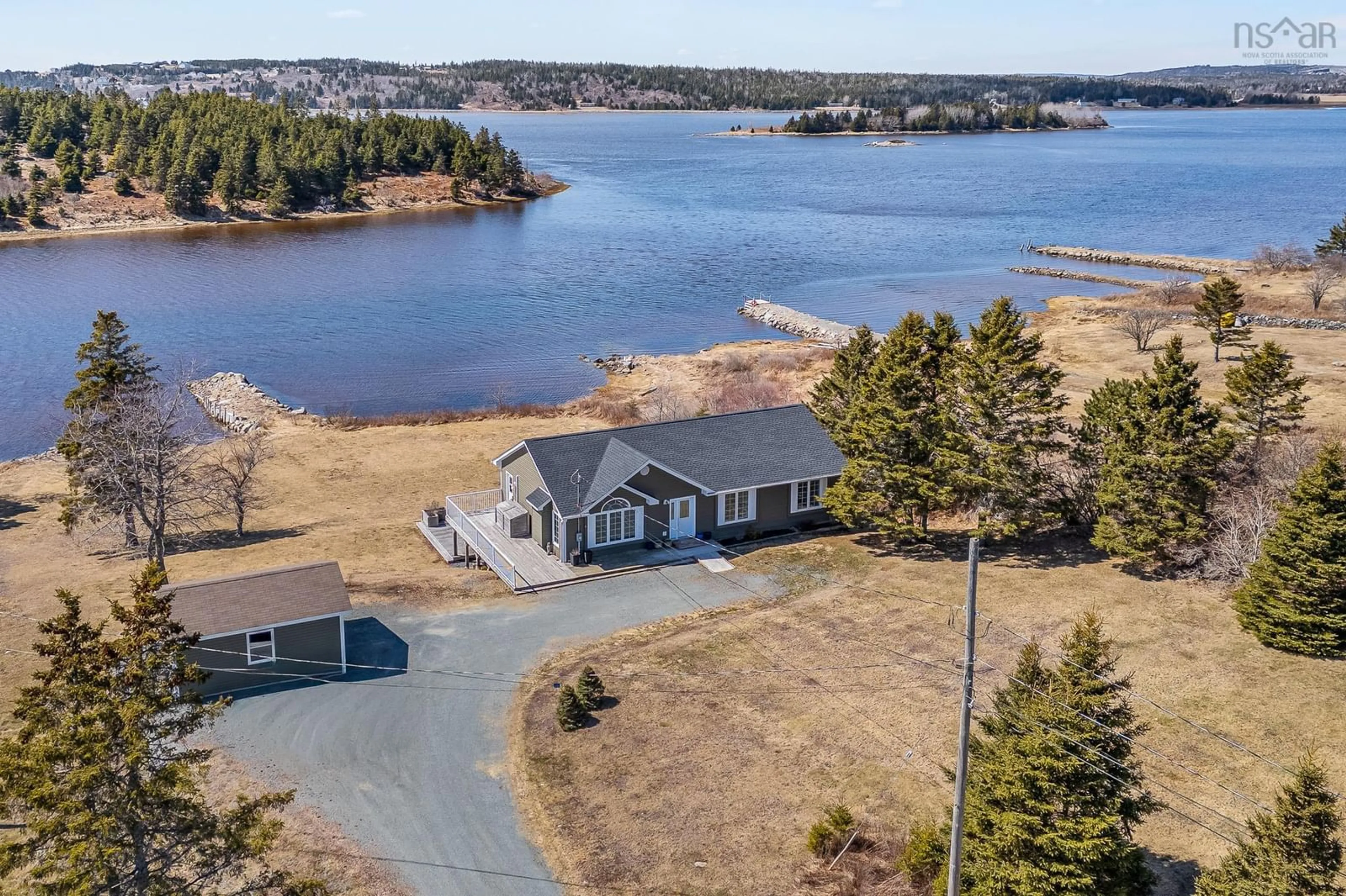 A pic from outside/outdoor area/front of a property/back of a property/a pic from drone, water/lake/river/ocean view for 28 Morgans Landng, East Chezzetcook Nova Scotia B0J 1N0