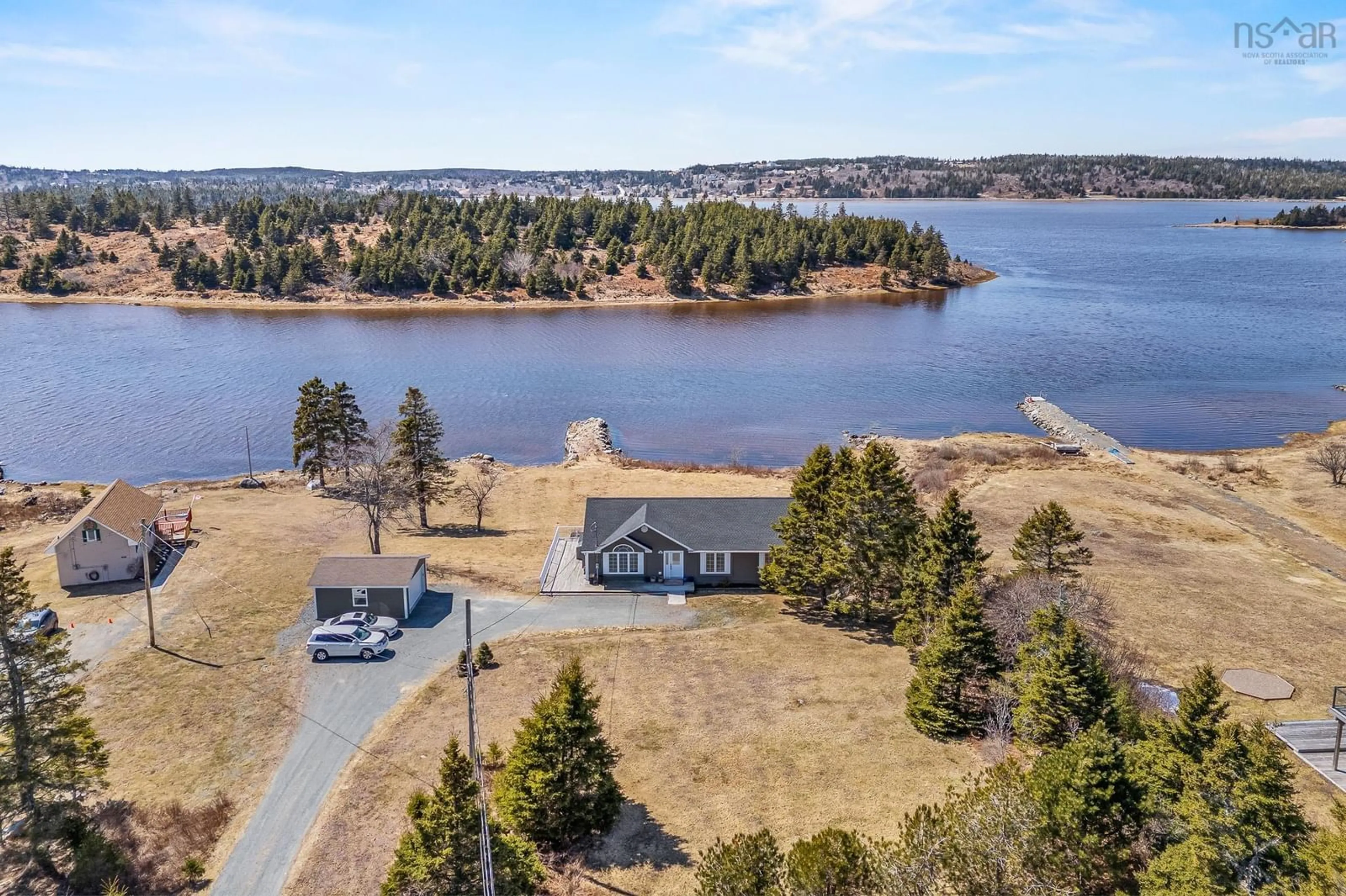 A pic from outside/outdoor area/front of a property/back of a property/a pic from drone, water/lake/river/ocean view for 28 Morgans Landng, East Chezzetcook Nova Scotia B0J 1N0
