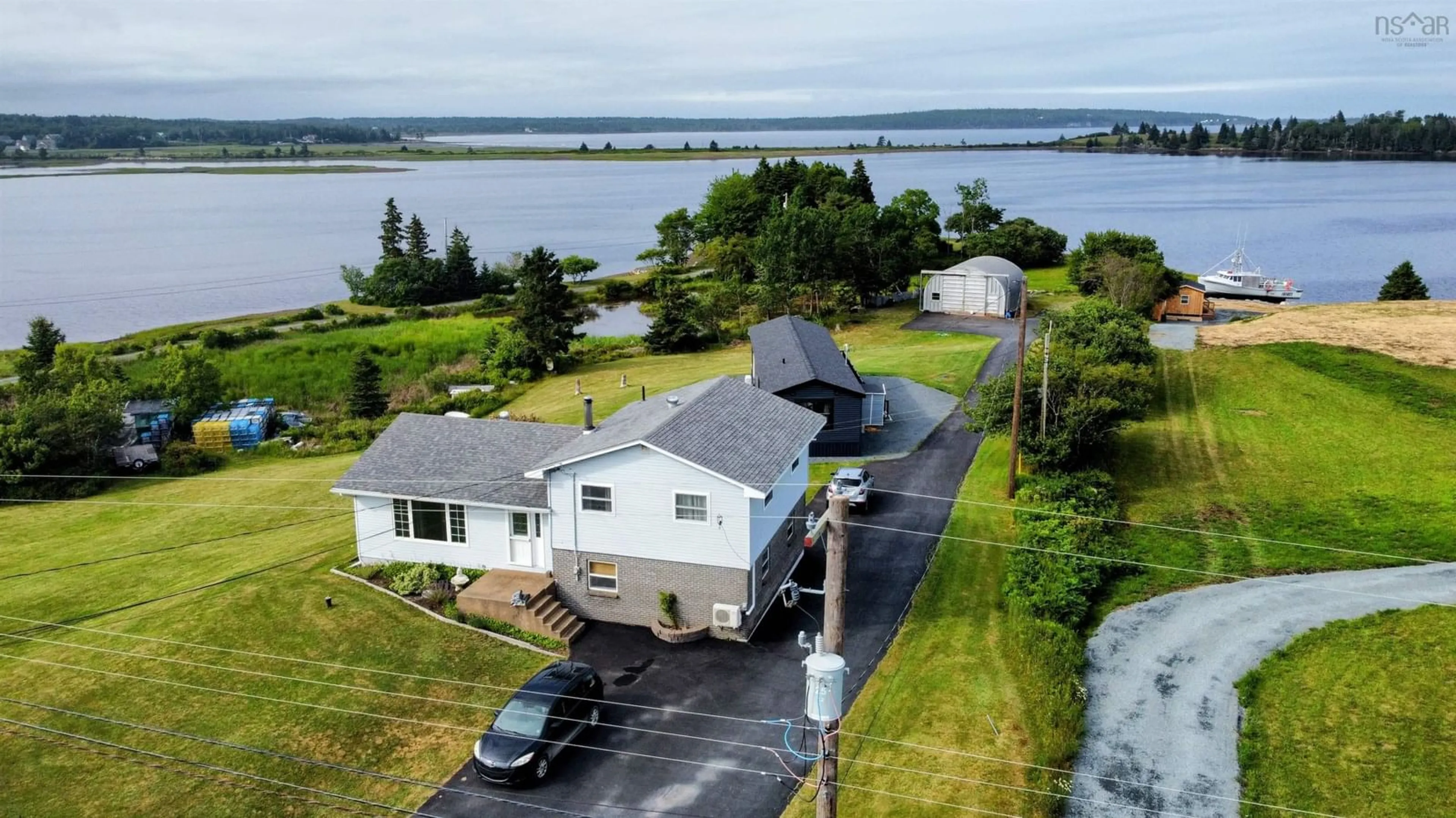 A pic from outside/outdoor area/front of a property/back of a property/a pic from drone, water/lake/river/ocean view for 227 Kingsburg Rd, Lower Rose Bay Nova Scotia B0J 2X0