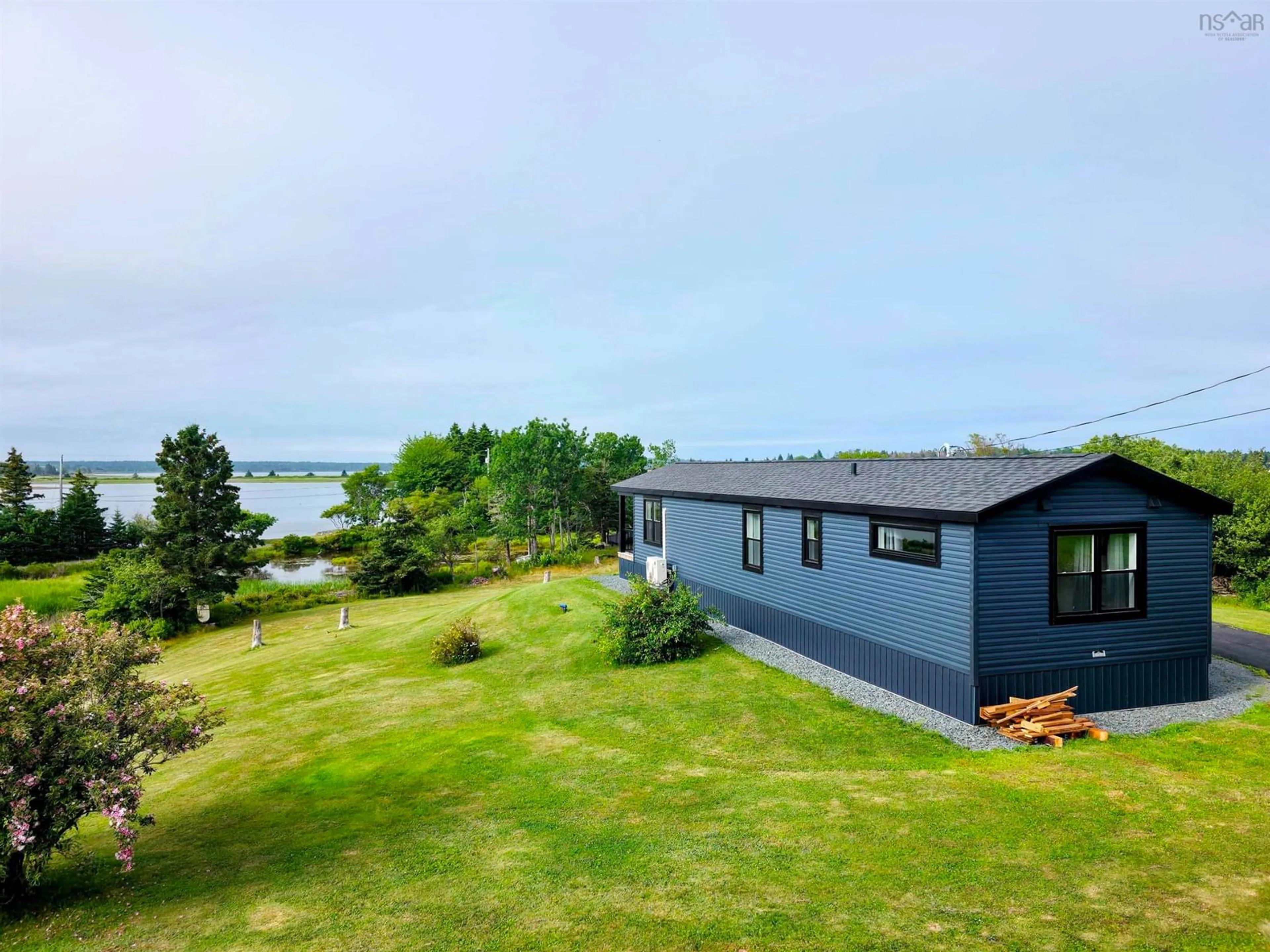 A pic from outside/outdoor area/front of a property/back of a property/a pic from drone, water/lake/river/ocean view for 227 Kingsburg Rd, Lower Rose Bay Nova Scotia B0J 2X0