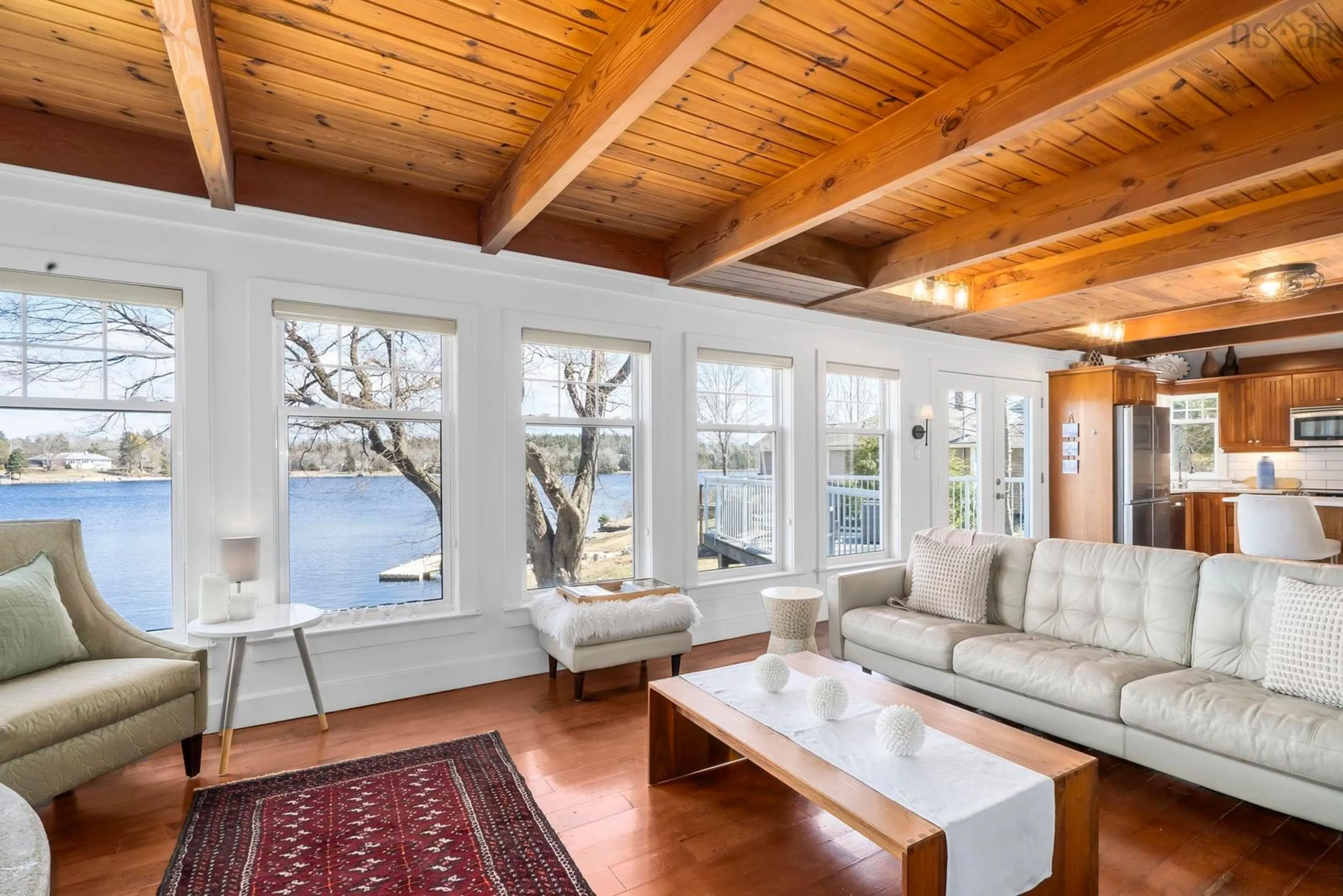 Living room with furniture, wood/laminate floor for 10 Schooner Cove Rd, Head Of St. Margarets Bay Nova Scotia B3Z 2B4
