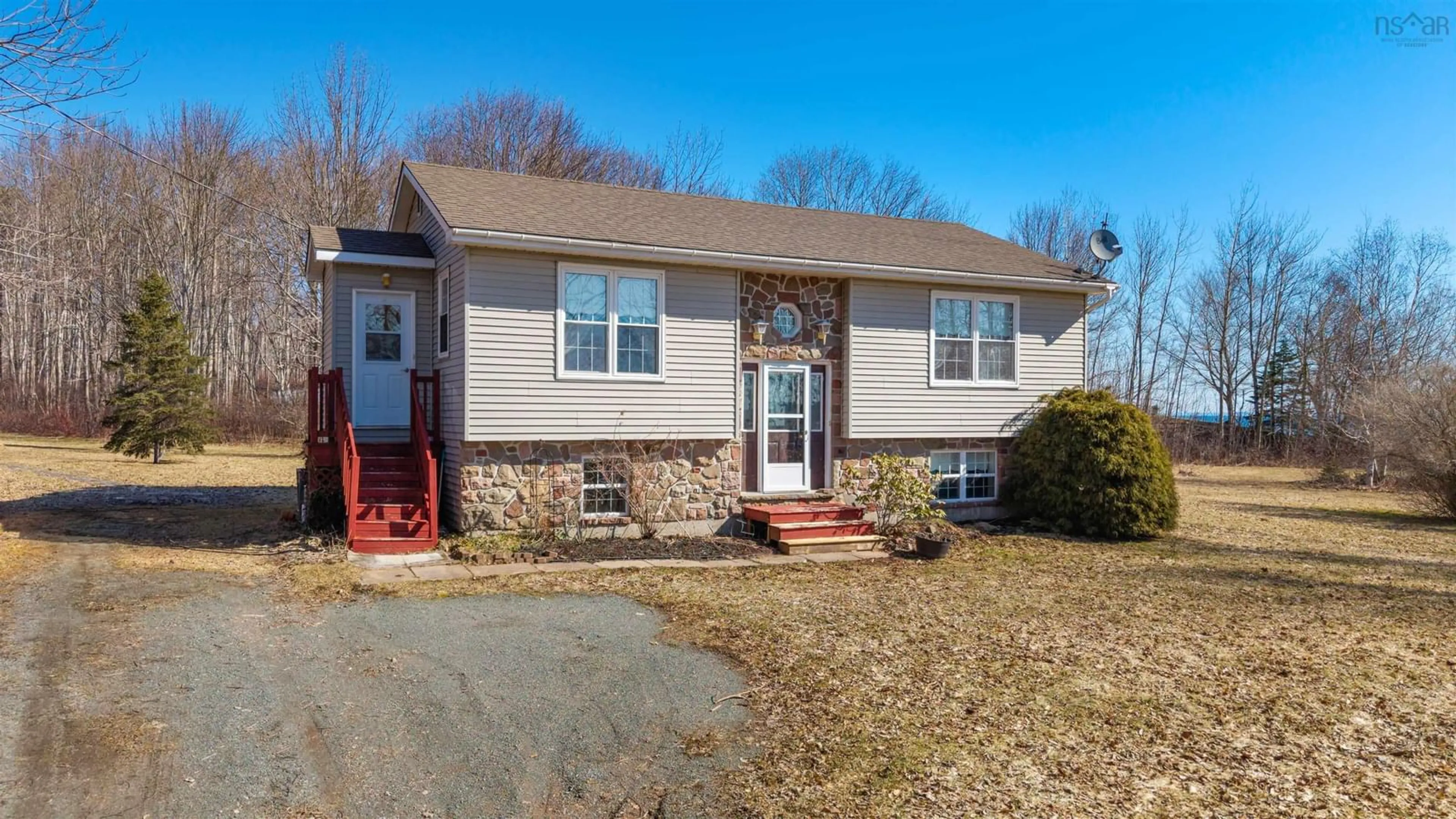 Home with vinyl exterior material, street for 107 Mahoneys Beach Rd, Mahoneys Beach Nova Scotia B2G 2L2