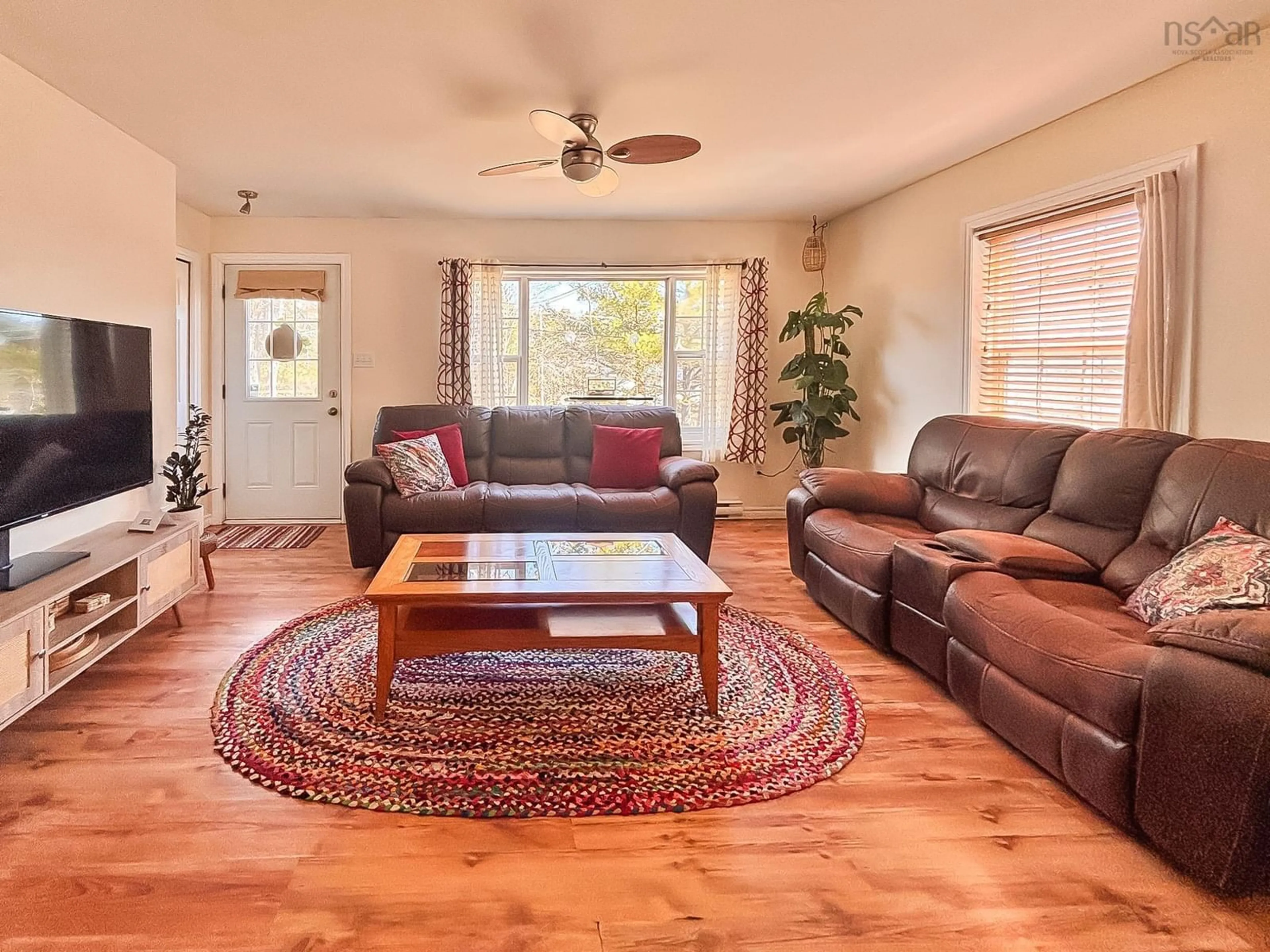 Living room with furniture, wood/laminate floor for 1895 Upper Branch Rd, Midville Branch Nova Scotia B4V 4S7