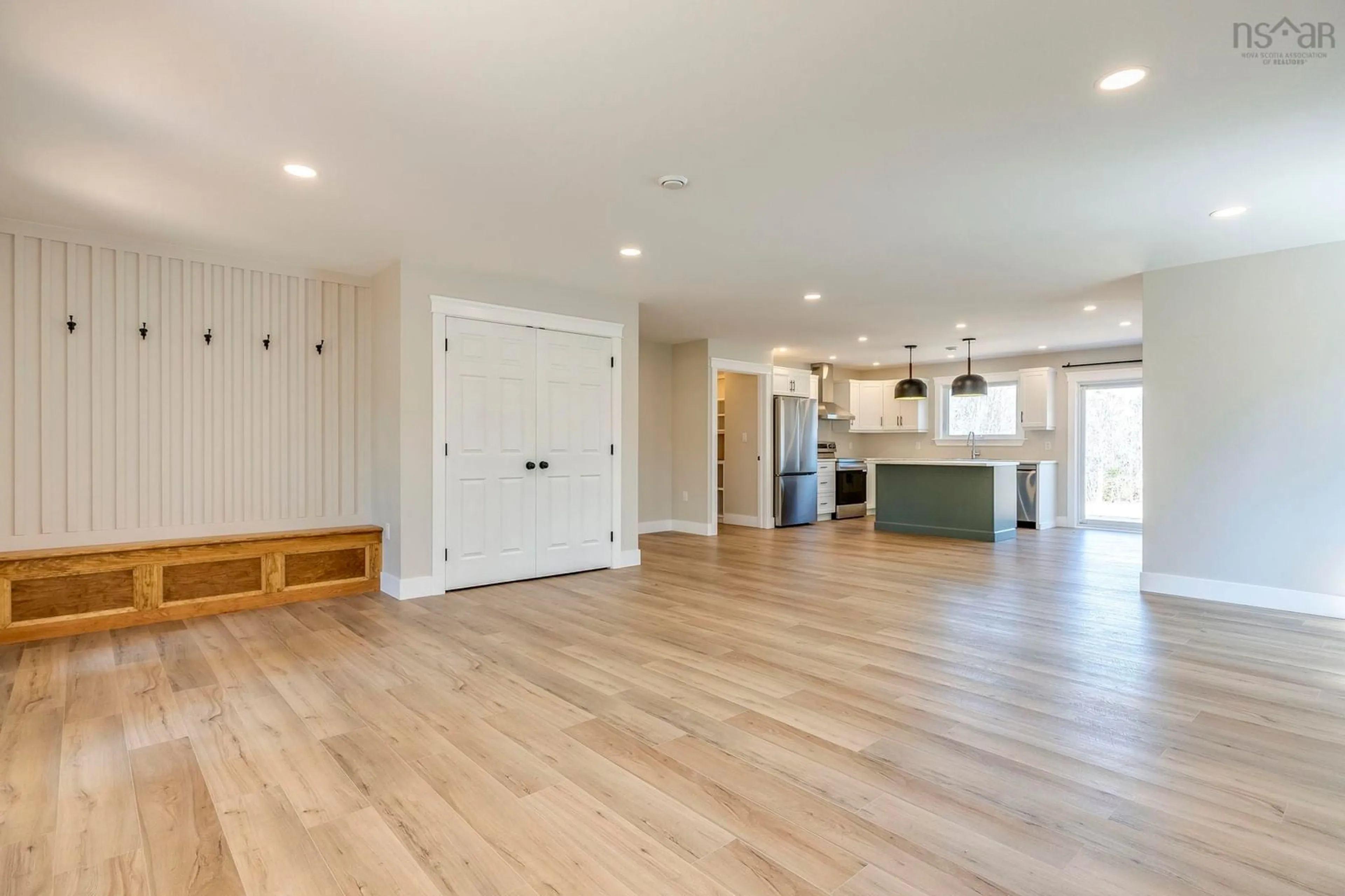 Open concept kitchen, wood/laminate floor for 1960 Long Point Rd, Burlington Nova Scotia B0P 1E0