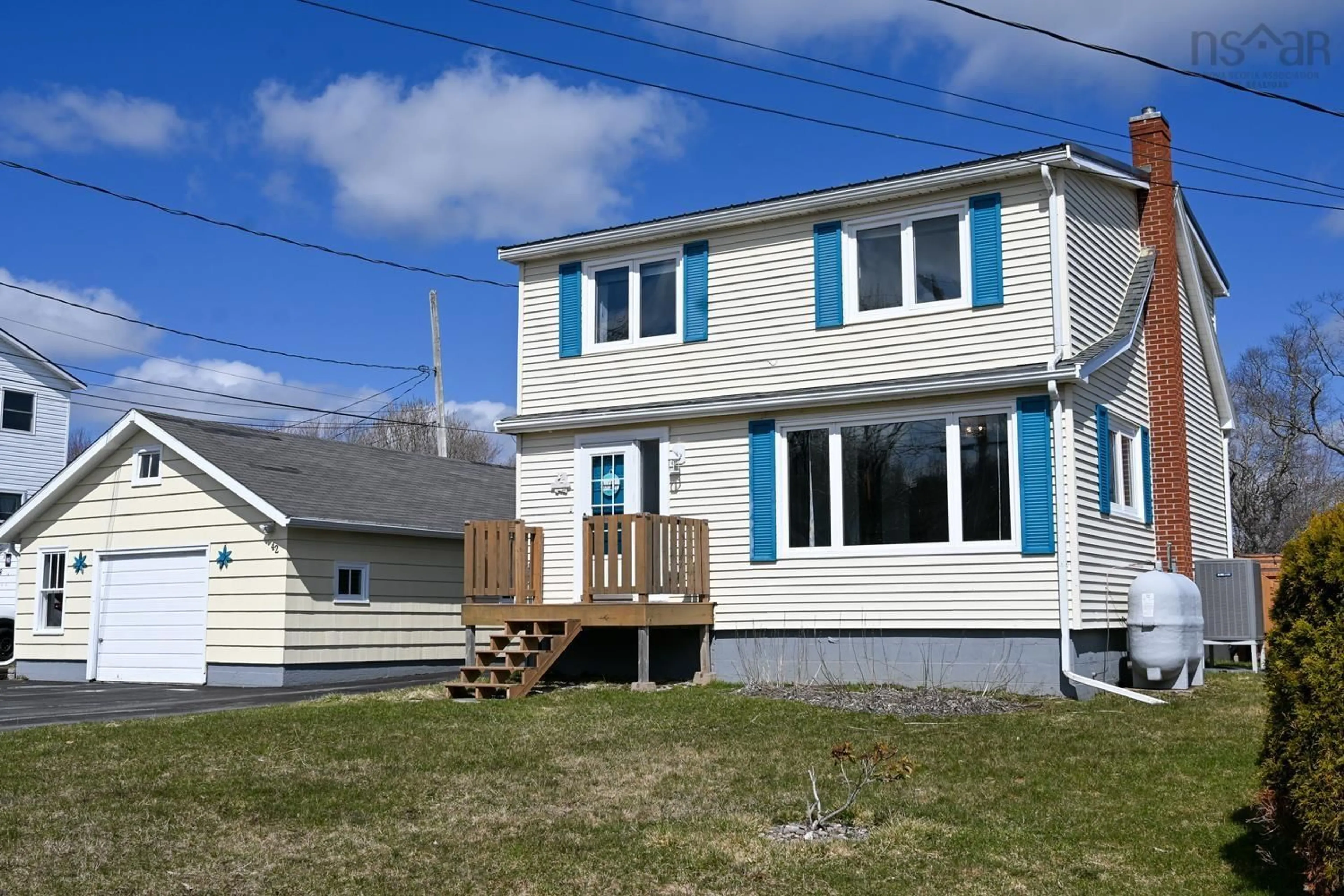 Home with vinyl exterior material, street for 42 Young Rd, Western Shore Nova Scotia B0J 3M0