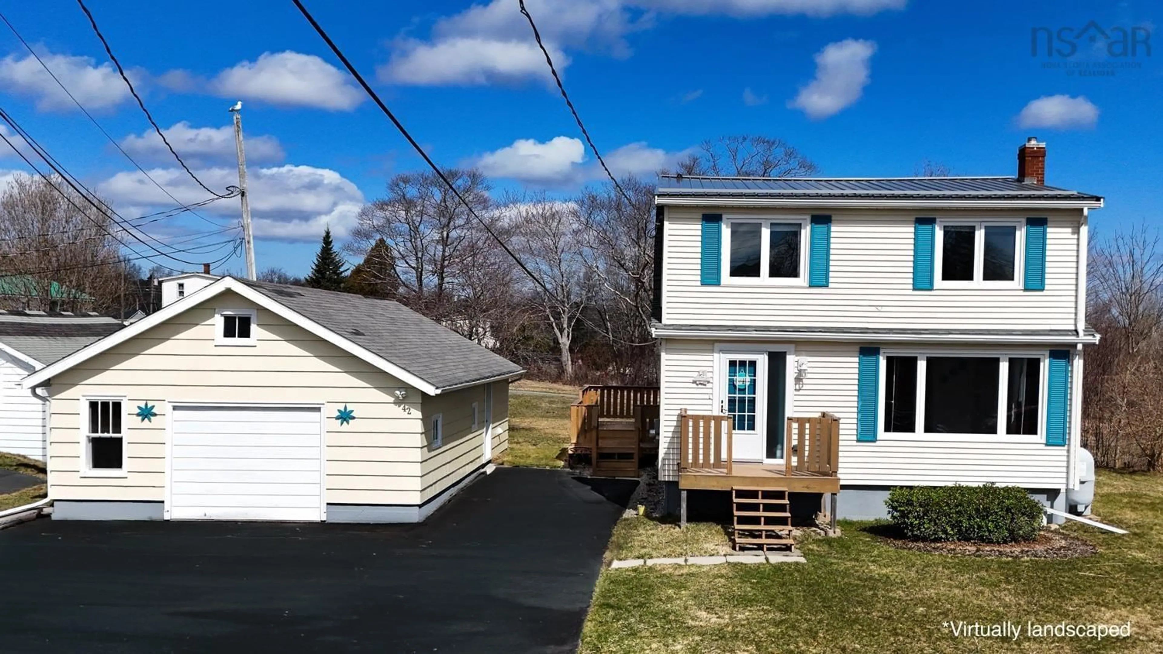 A pic from outside/outdoor area/front of a property/back of a property/a pic from drone, street for 42 Young Rd, Western Shore Nova Scotia B0J 3M0