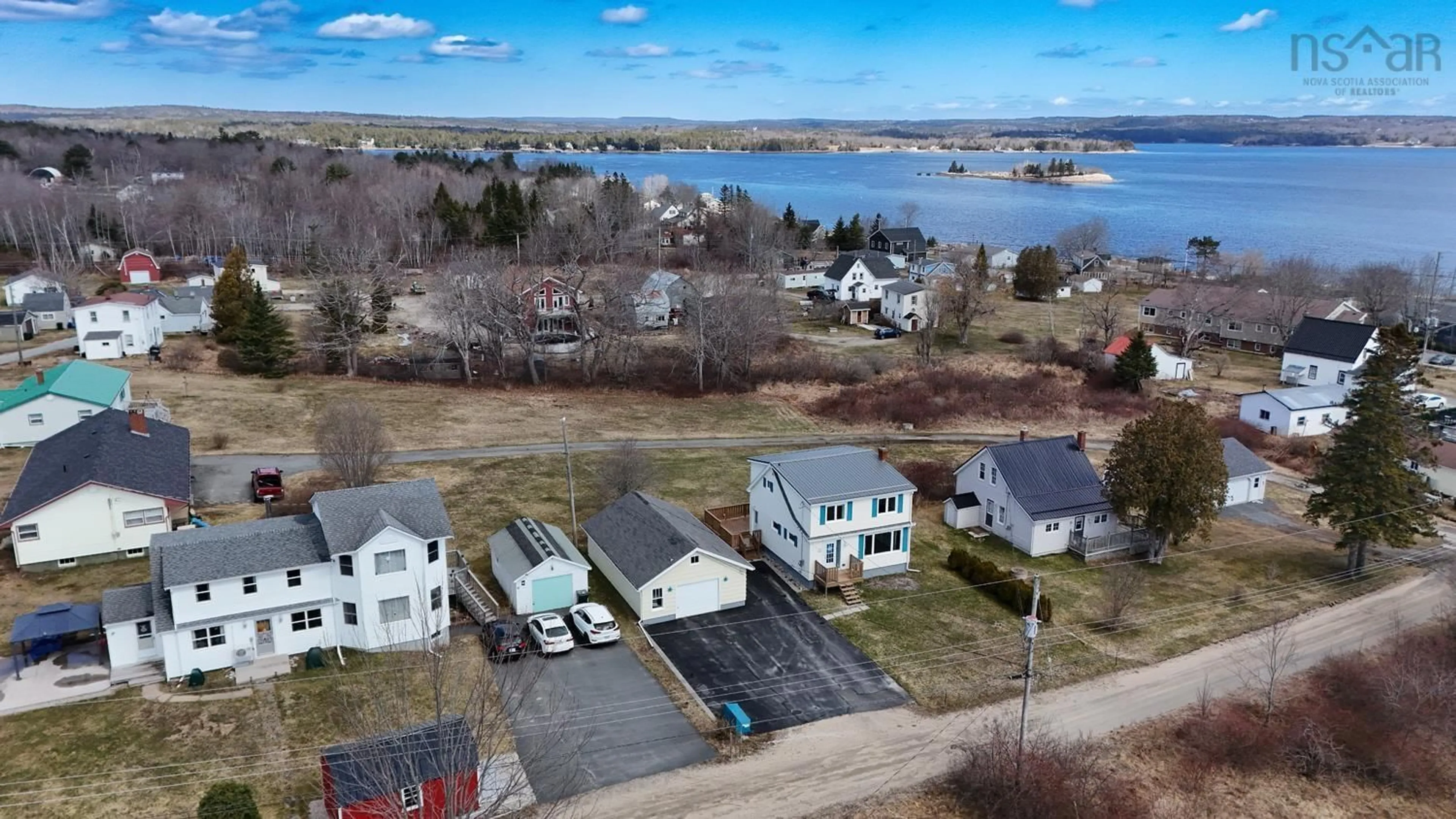 A pic from outside/outdoor area/front of a property/back of a property/a pic from drone, water/lake/river/ocean view for 42 Young Rd, Western Shore Nova Scotia B0J 3M0
